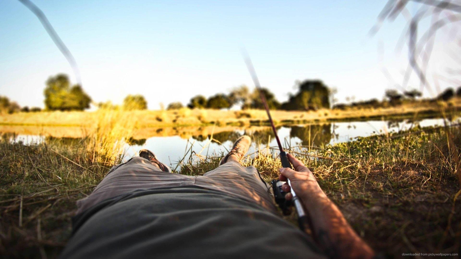 Reeling it in - A Fisherman Enjoying His Catch — 1920x1080 wallpaper