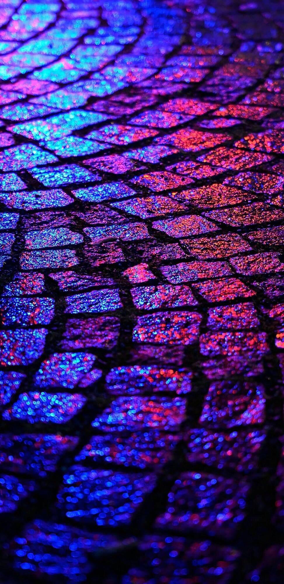 Reflected Oled On Pavement — 973x2000 wallpaper