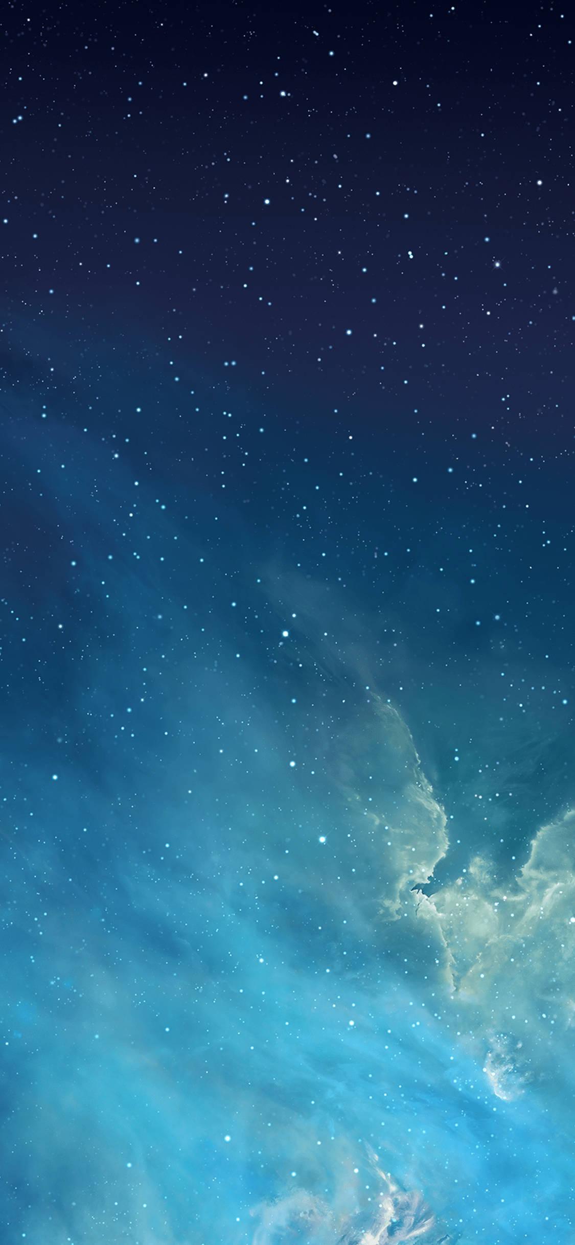 Refreshing blue sky, bright stars, and the iconic Apple logo — 1125x2436 wallpaper