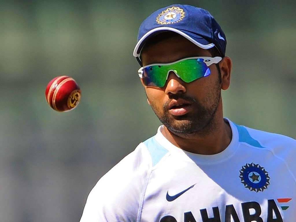 Rohit Sharma Floating Red Ball — 1024x768 wallpaper