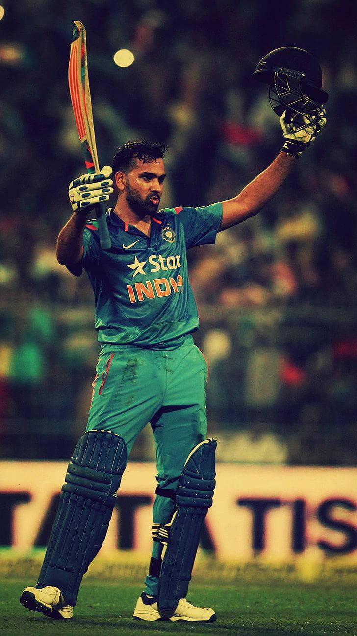 Rohit Sharma In Green Cricket Uniform — 728x1294 wallpaper