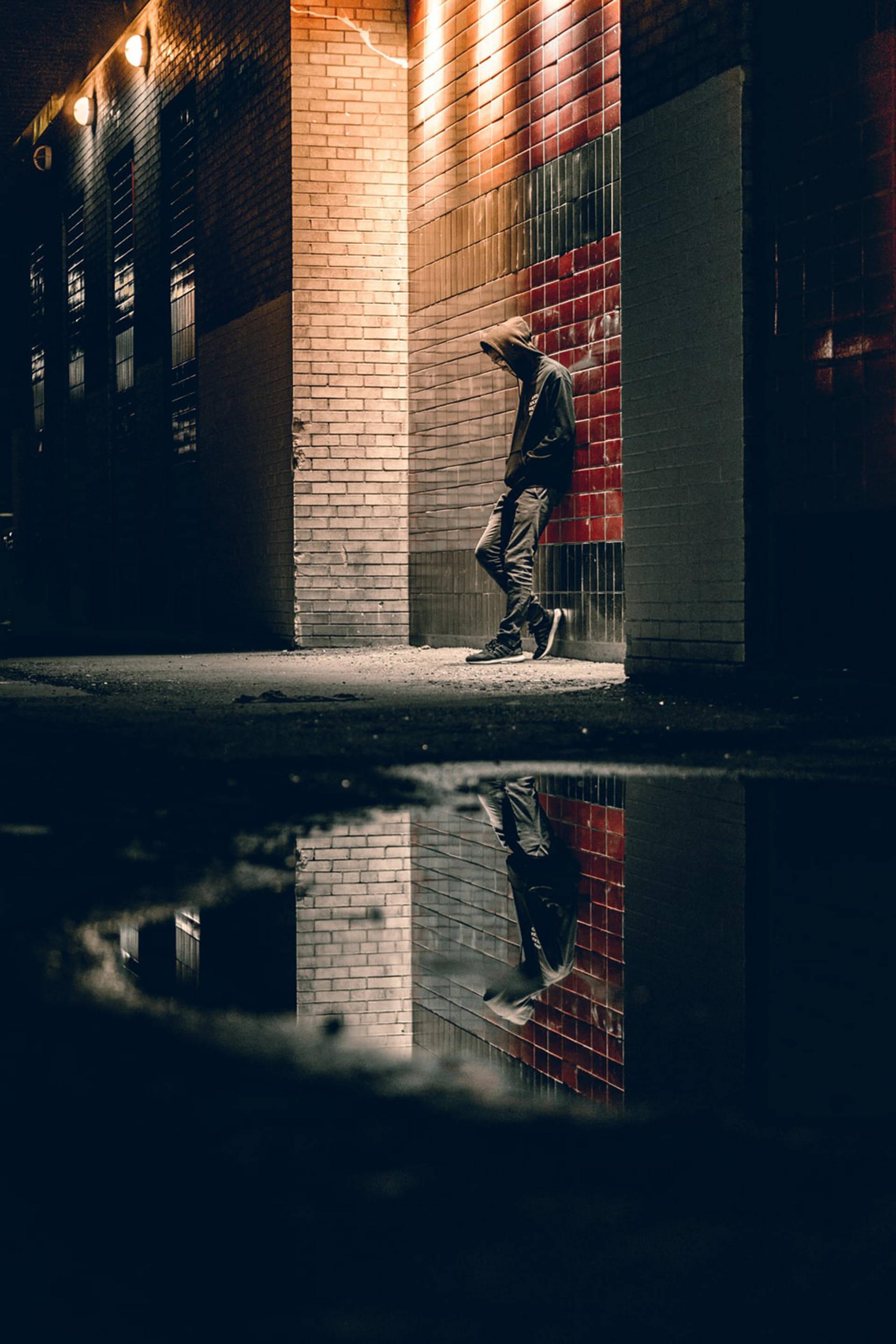 Sad Boy At Building Facade — 1920x2880 wallpaper
