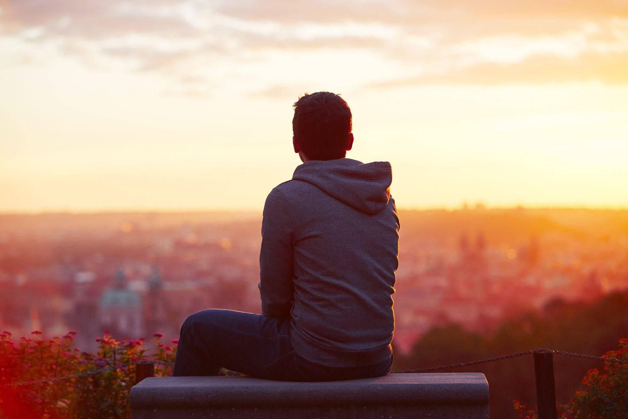 Sad Boy Over Cityscape — 2048x1366 wallpaper