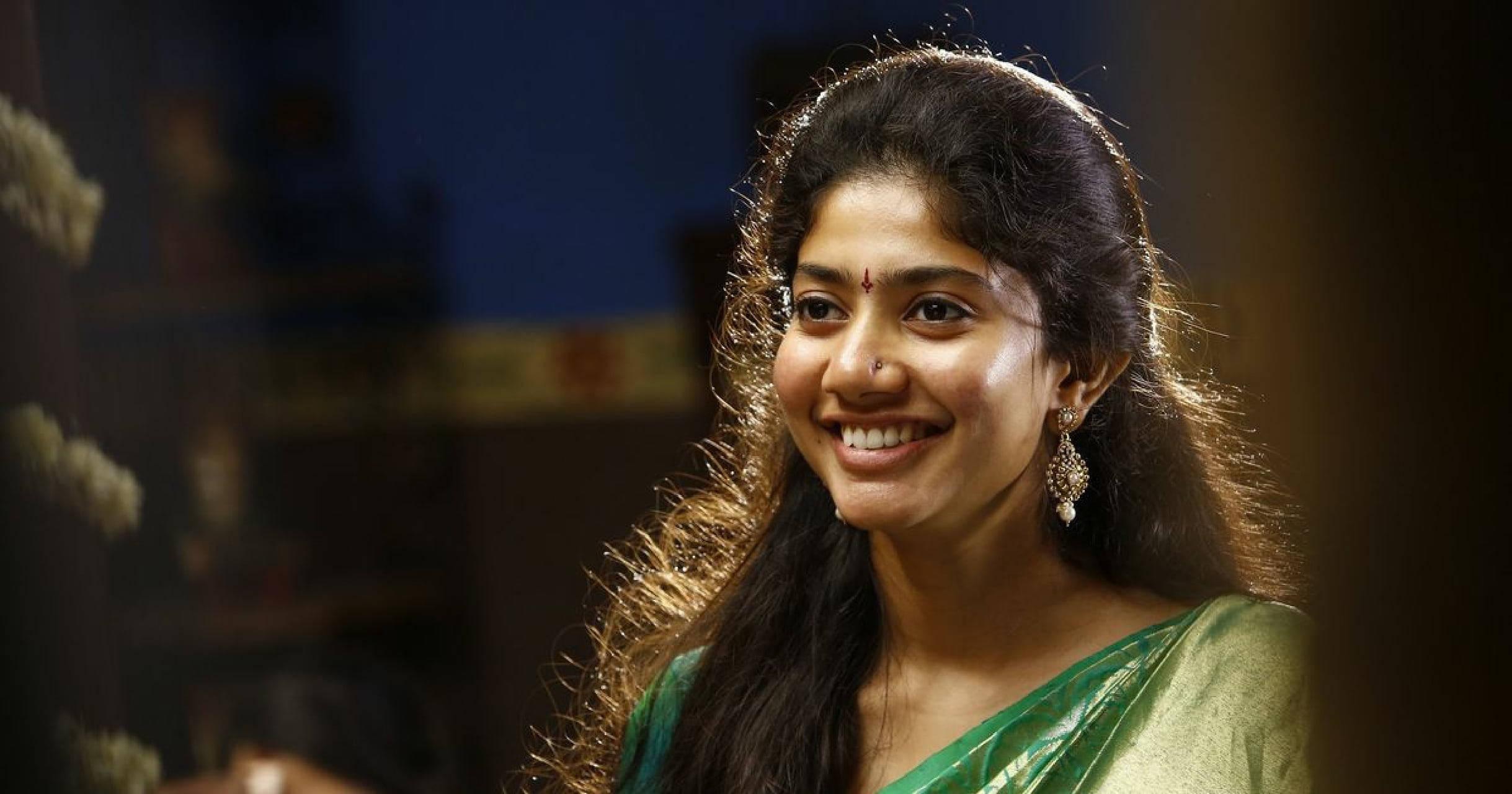 Sai Pallavi Against Dim Light — 2438x1280 wallpaper