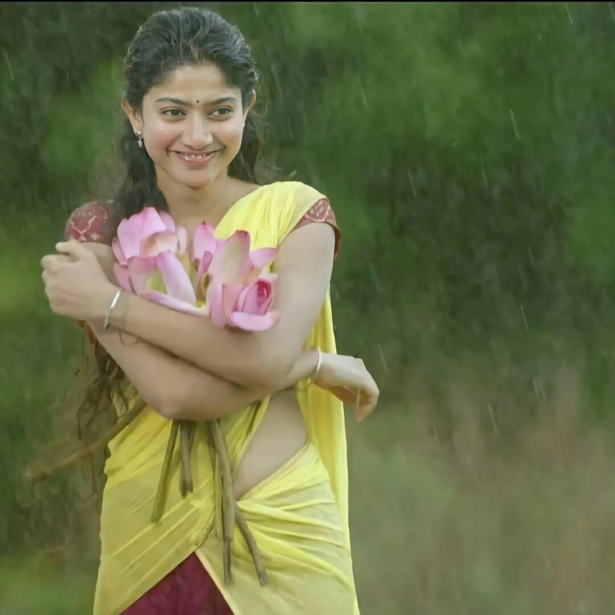 Sai Pallavi Holding Tulip Flowers — 2160x2160 wallpaper