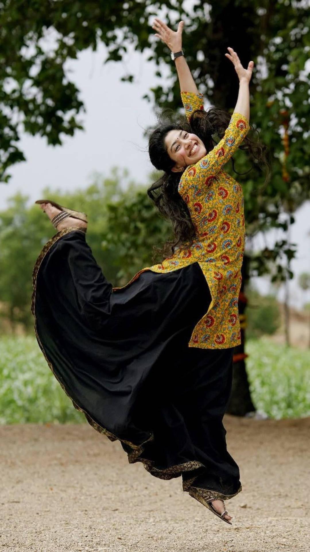 Sai Pallavi Jump Shot — 1080x1920 wallpaper