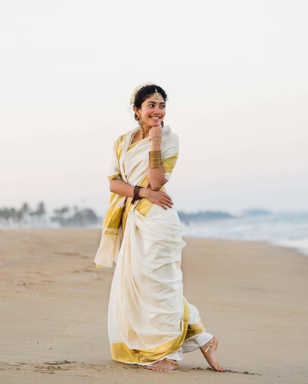 Sai Pallavi Modeling Near Seashore — 1080x1346 wallpaper