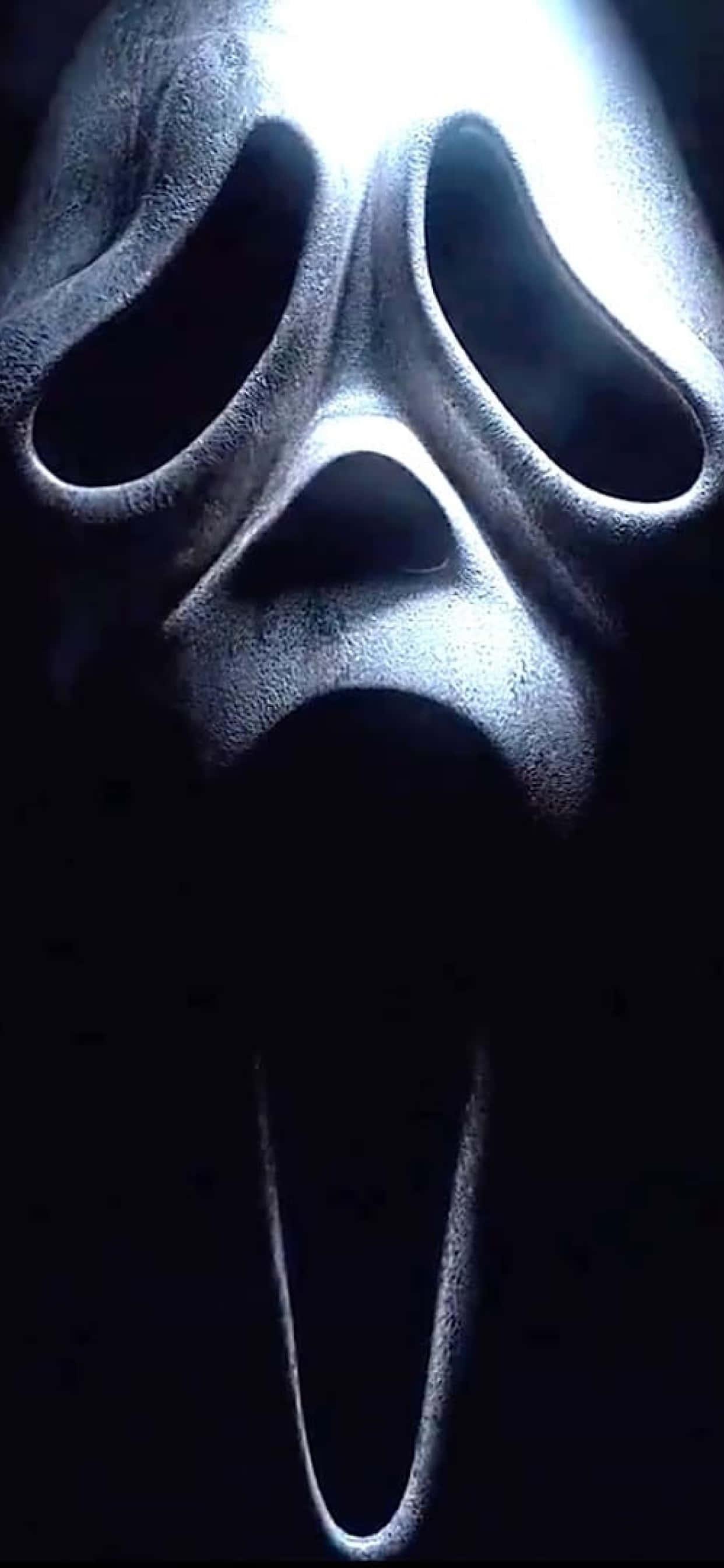 scream movie poster with a white face — 1242x2688 wallpaper