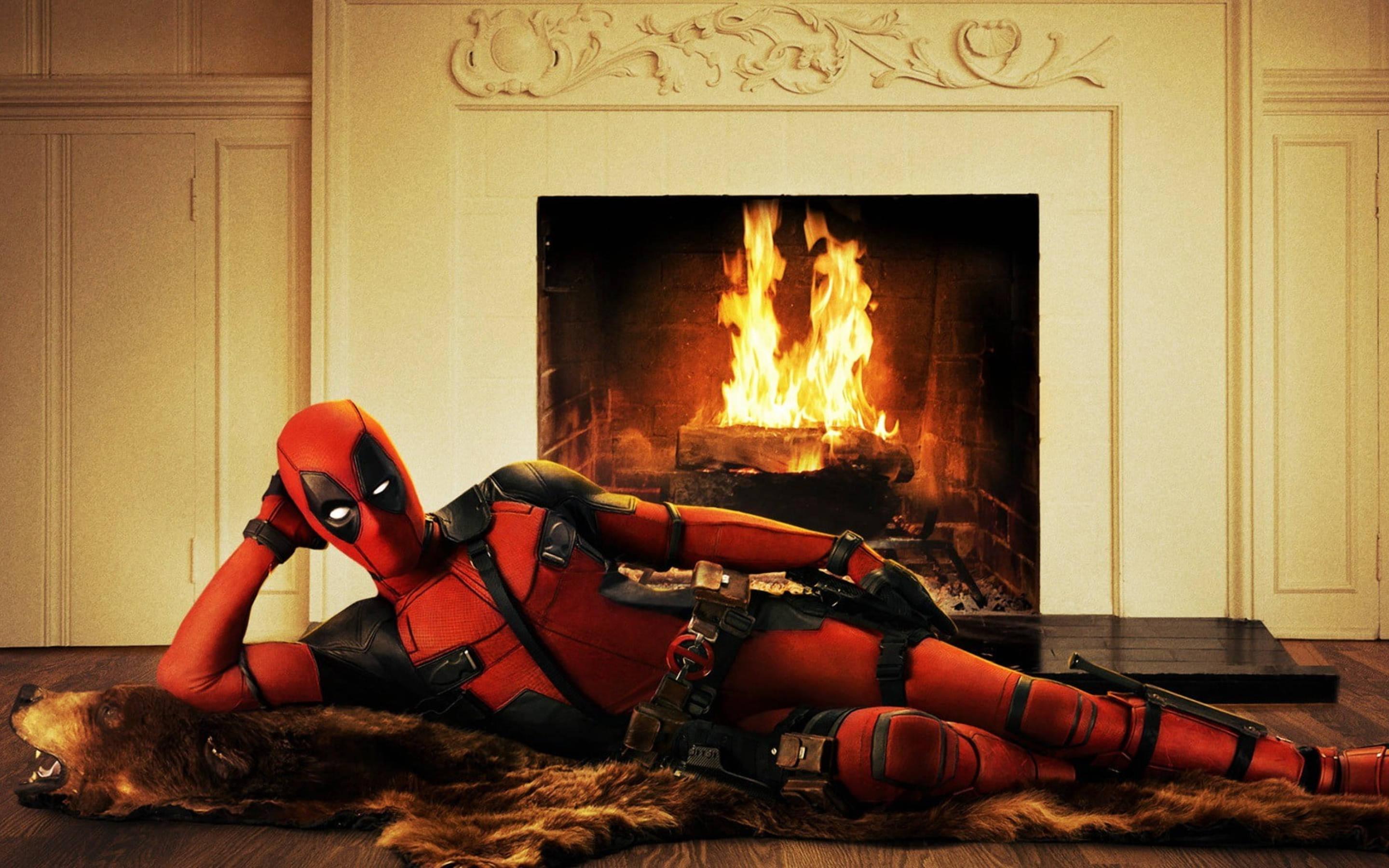 Seductive Deadpool On A Fireplace — 2880x1800 wallpaper