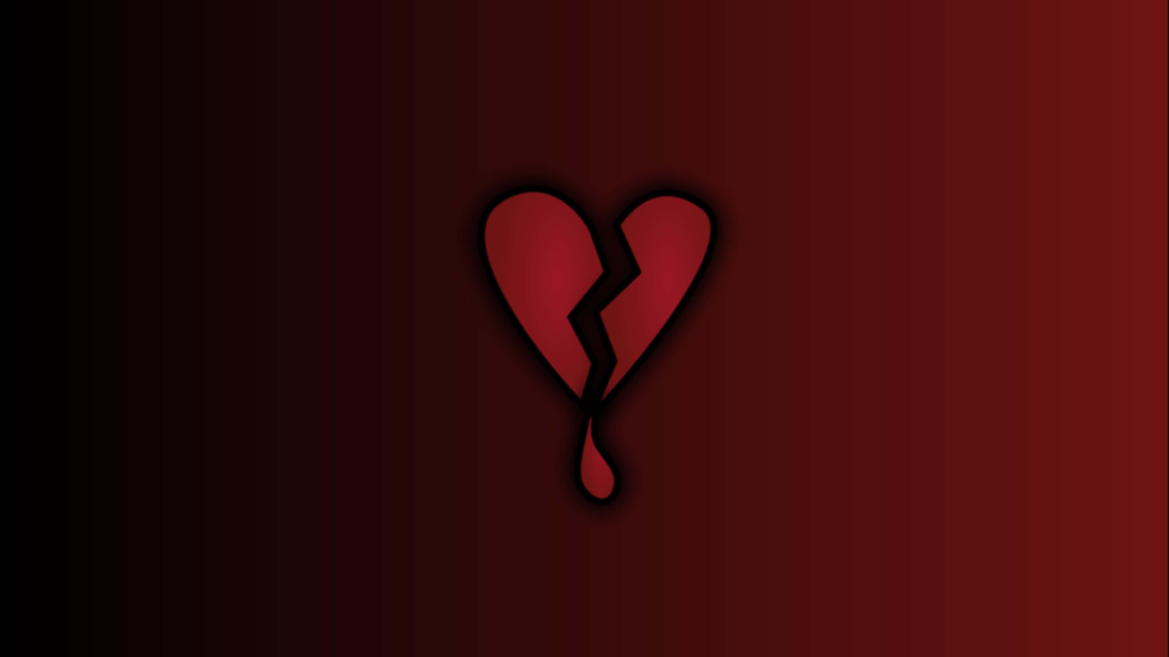 Shattered Heart on Dark Backdrop — 3840x2160 wallpaper