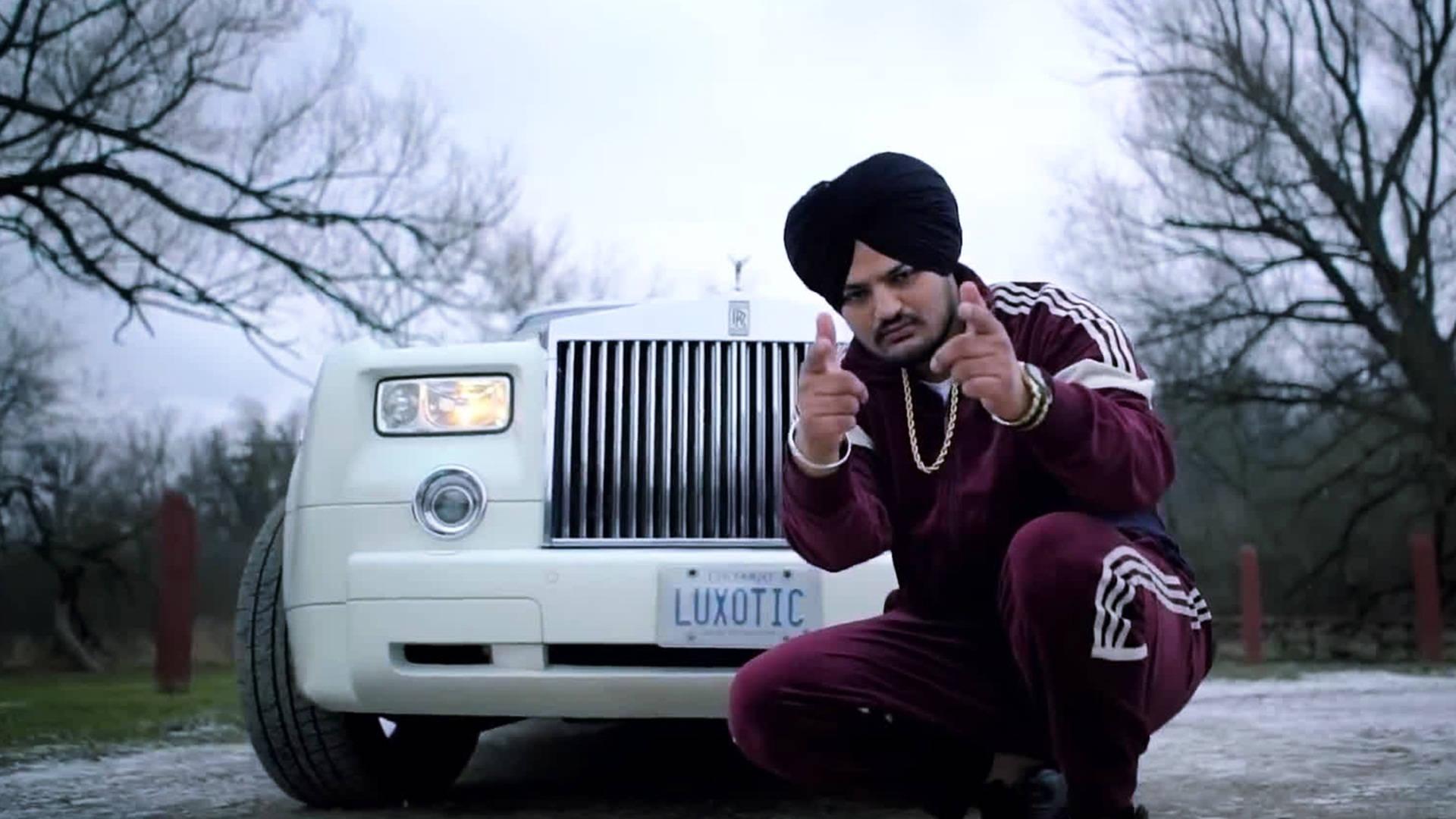 Sidhu moose wala mit einer rolls royce