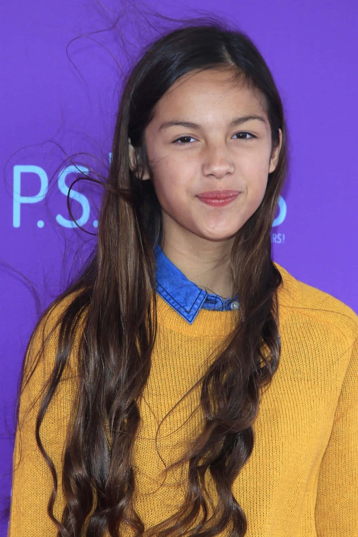 Singer and Actor Olivia Rodrigo strikes a pose — 1200x1800 wallpaper