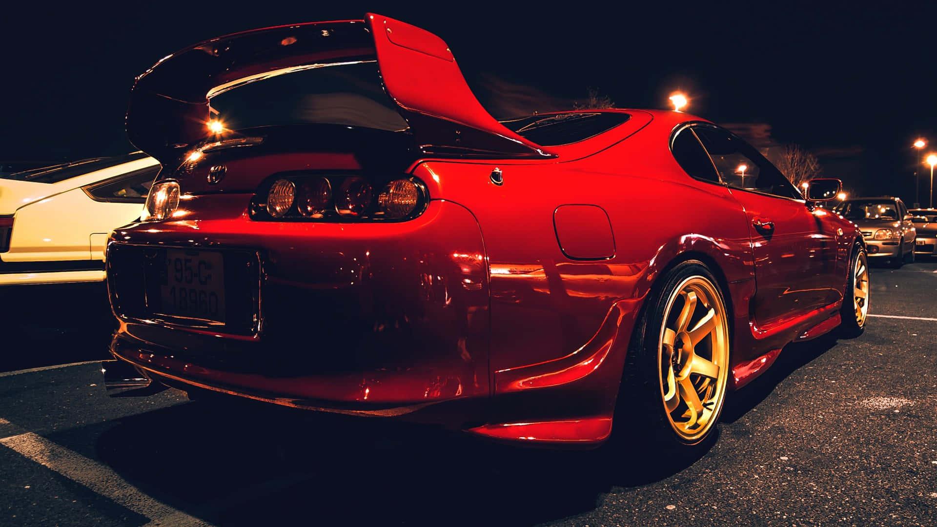 Sleek Red Toyota Supra on a Scenic Highway — 1920x1080 wallpaper