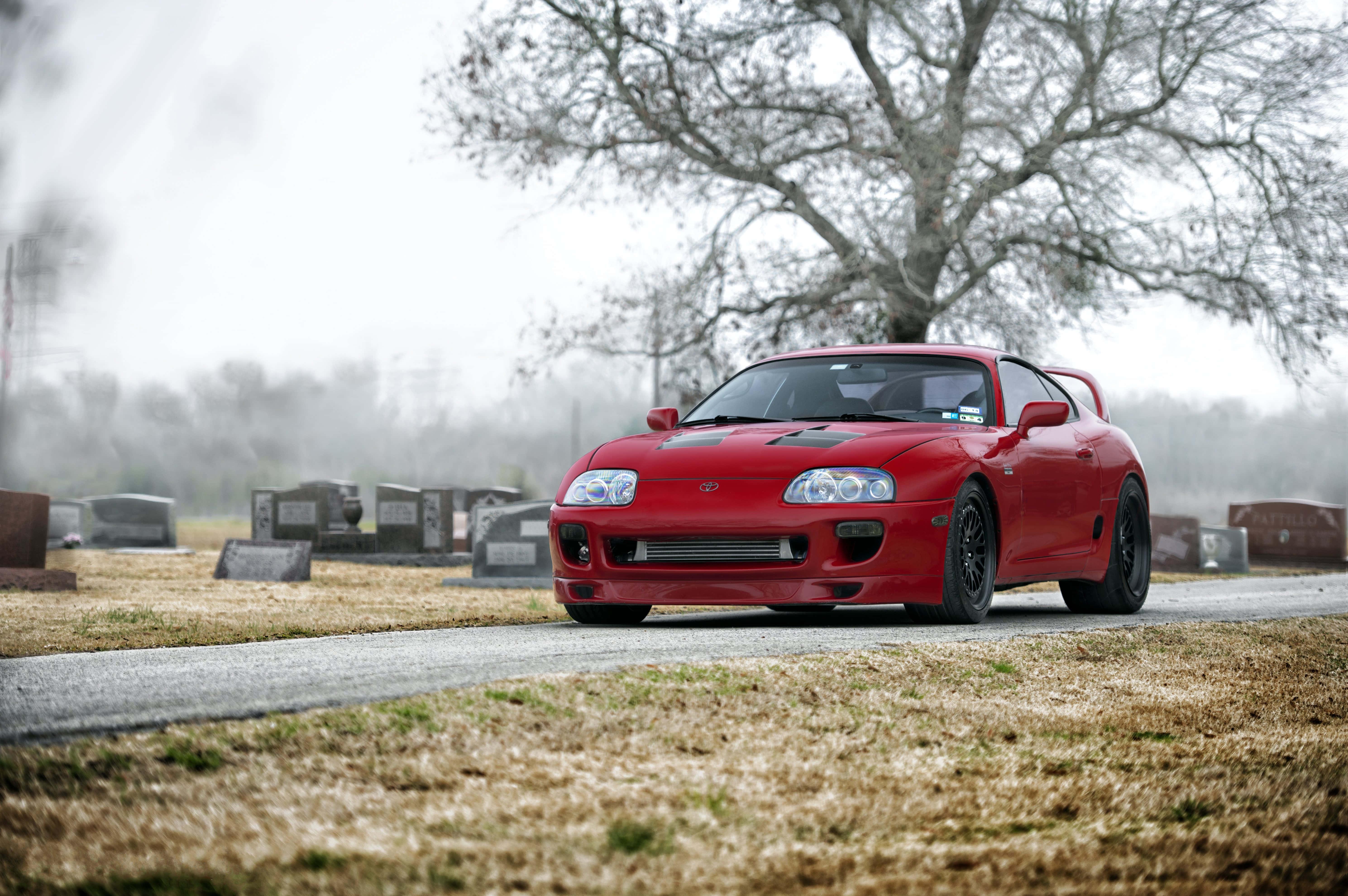 Sleek Toyota Supra on a Scenic Mountain Road — 5956x3962 wallpaper