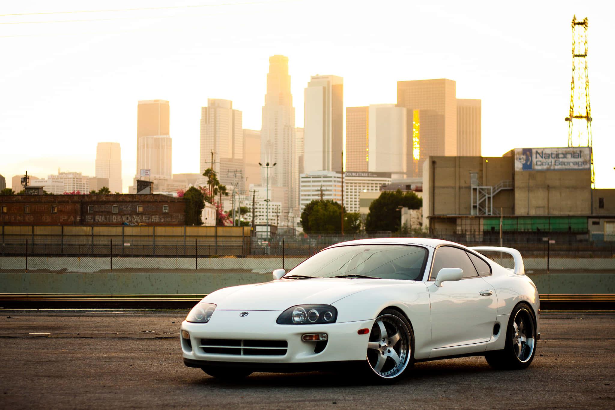 Sleek Toyota Supra Sports Car on the Open Road — 2048x1365 wallpaper