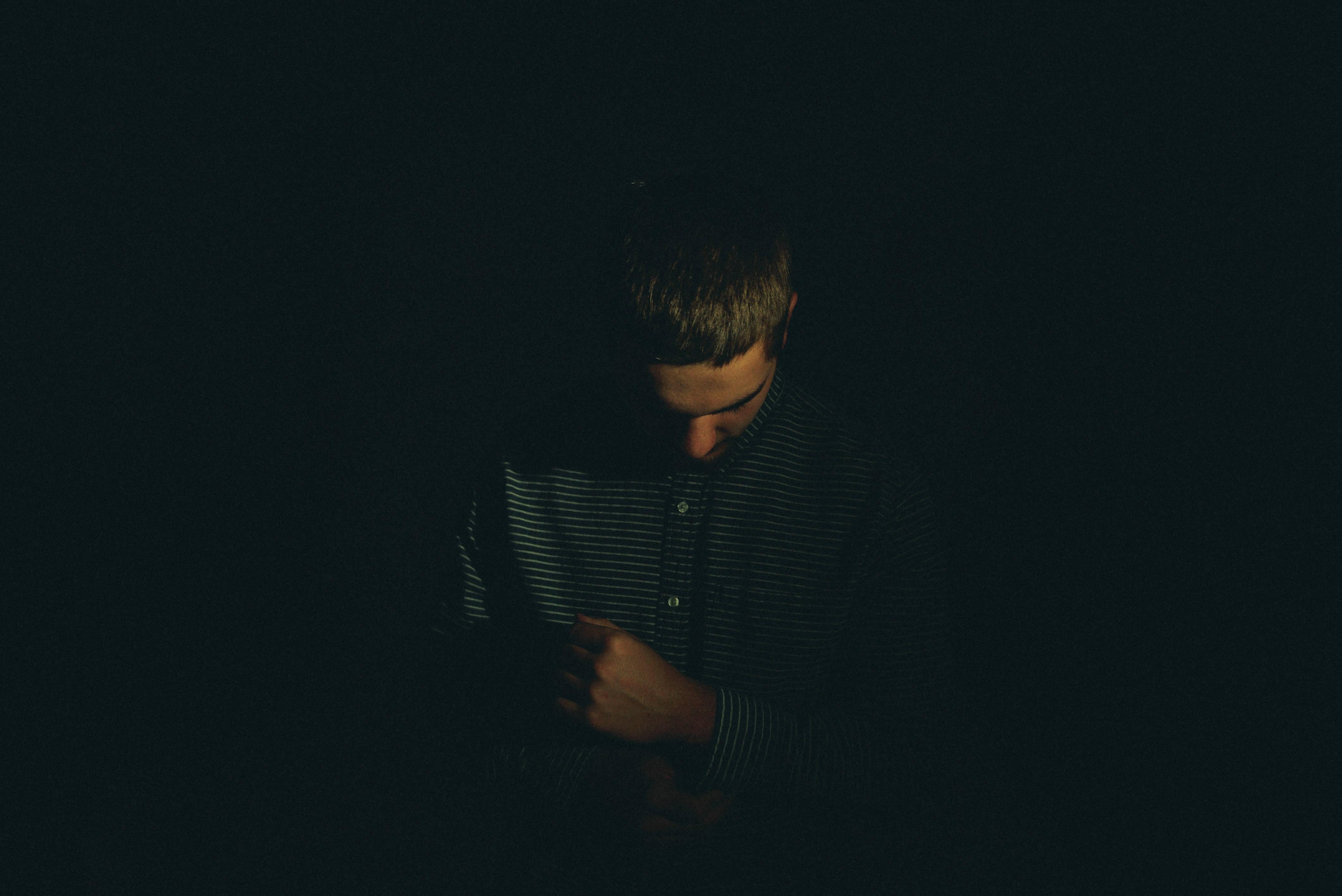 Solitude in Shadows - A Portrait of a Sad Boy — 4240x2832 wallpaper