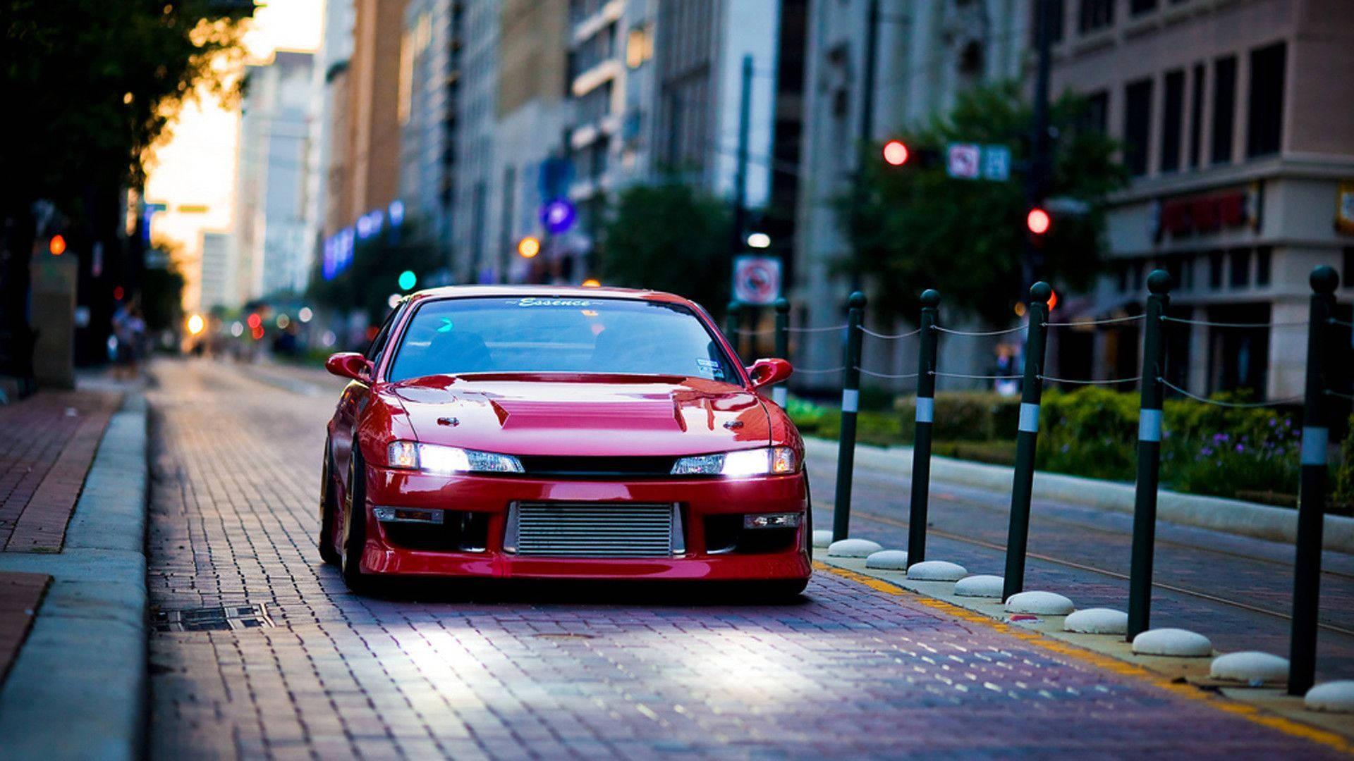 Speed and Style: Red Nissan Silvia S14 — 1920x1080 wallpaper