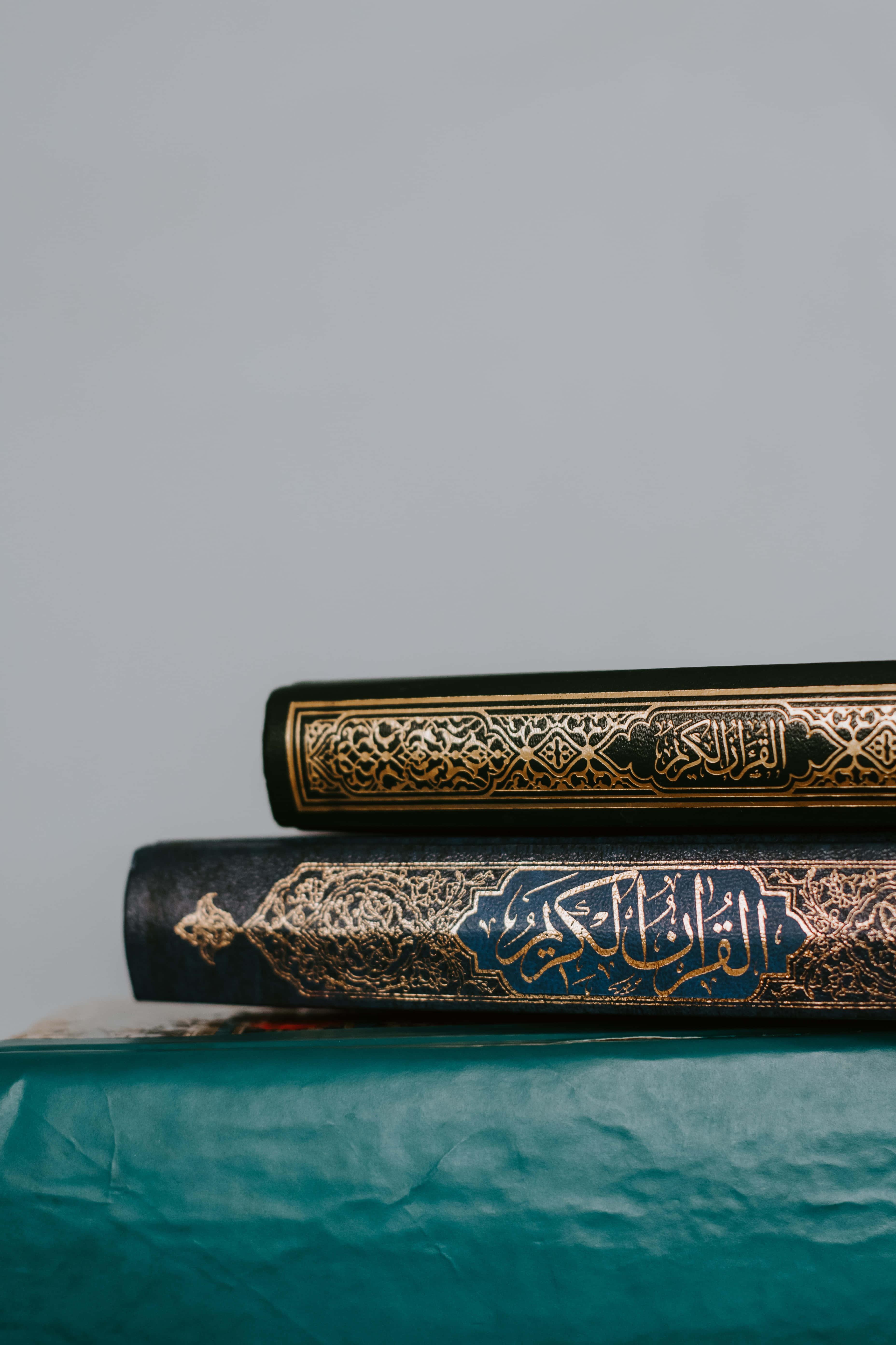 Stacked Holy Books Islamic Background — 3712x5568 wallpaper