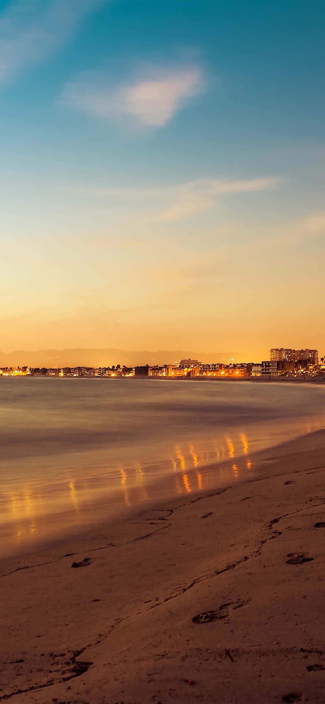 Stay connected even at the beach with the latest summer iPhone — 1125x2436 wallpaper