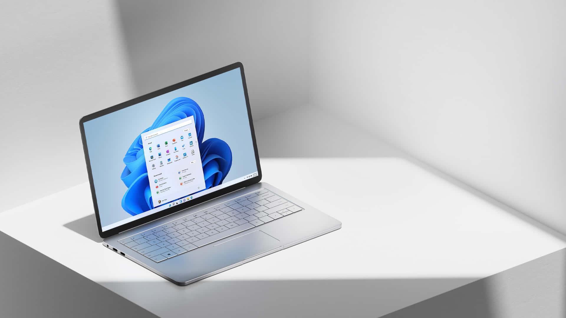 Stay connected with a sleek and powerful laptop. — 1920x1080 wallpaper