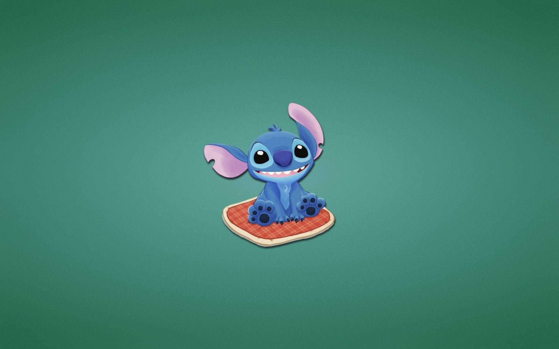 Stitch snuggled up on a comfy pillow!