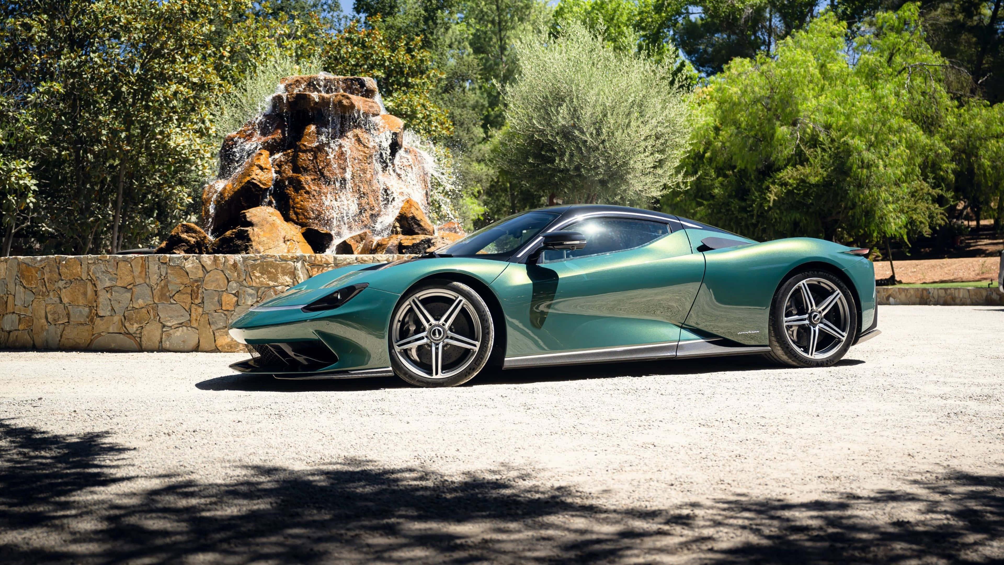 Stunning sports car gleaming under twilight sky — 3840x2160 wallpaper