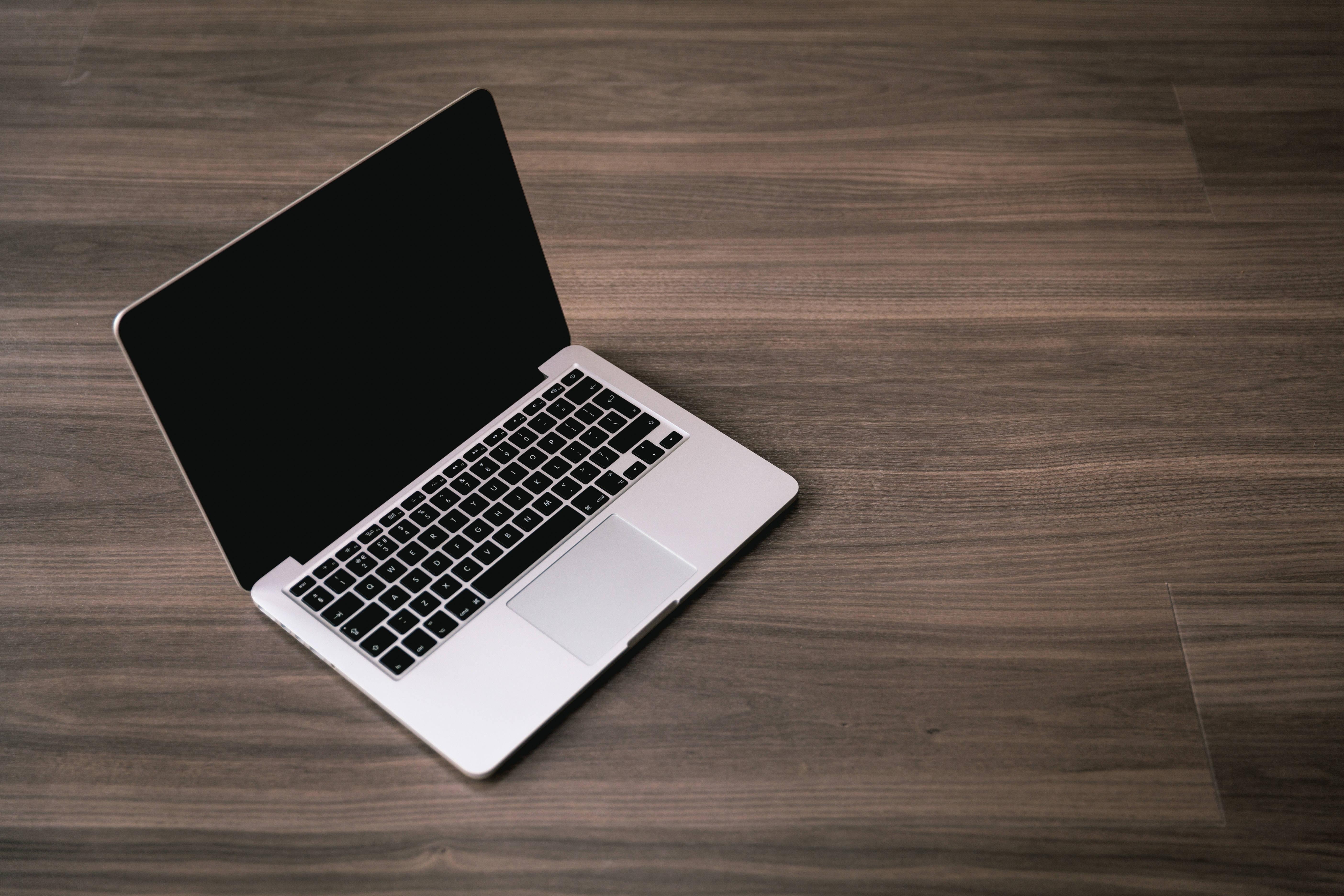 Stylish Pink Laptop with Creative Decor — 5616x3744 wallpaper