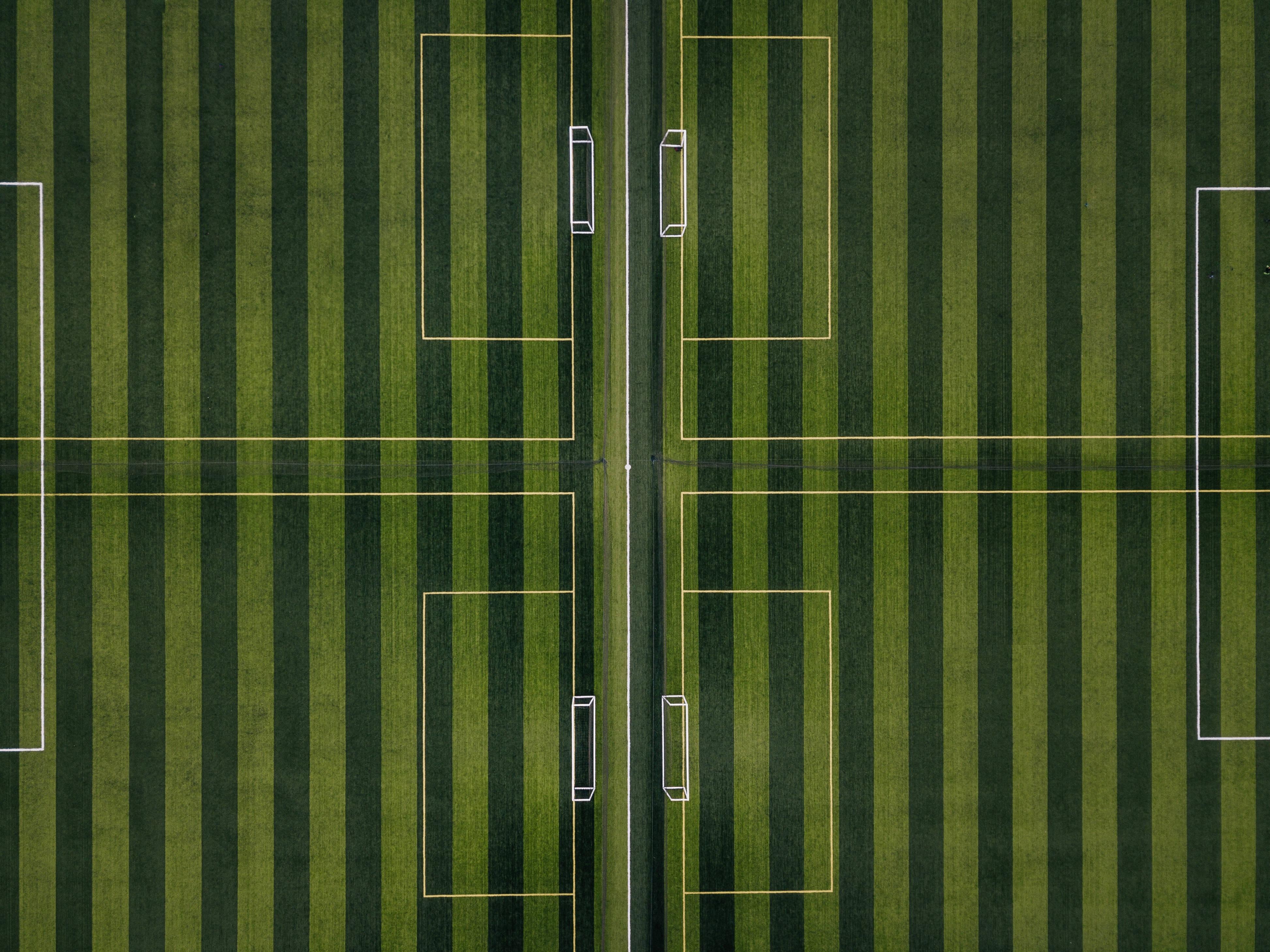 Take control of the game on the Striped Football Field — 3892x2917 wallpaper
