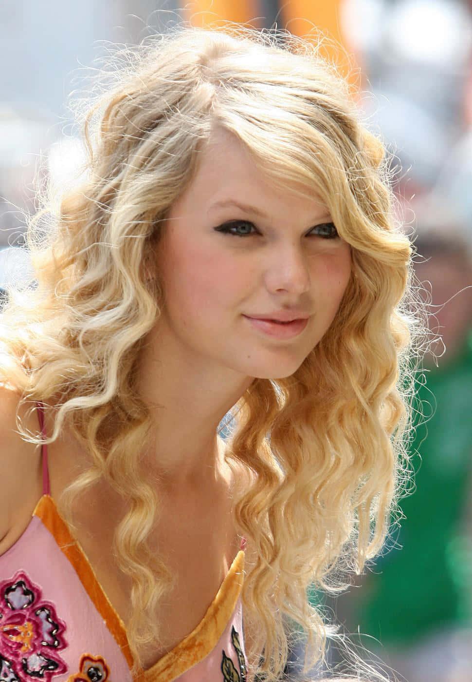Taylor Swift Performing at Her Latest Concert — 970x1399 wallpaper