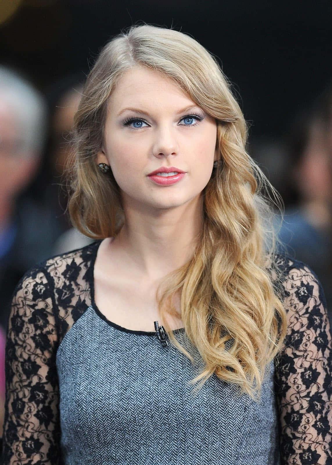 Taylor Swift smiles while promoting her latest album 'Lover' — 1143x1600 wallpaper