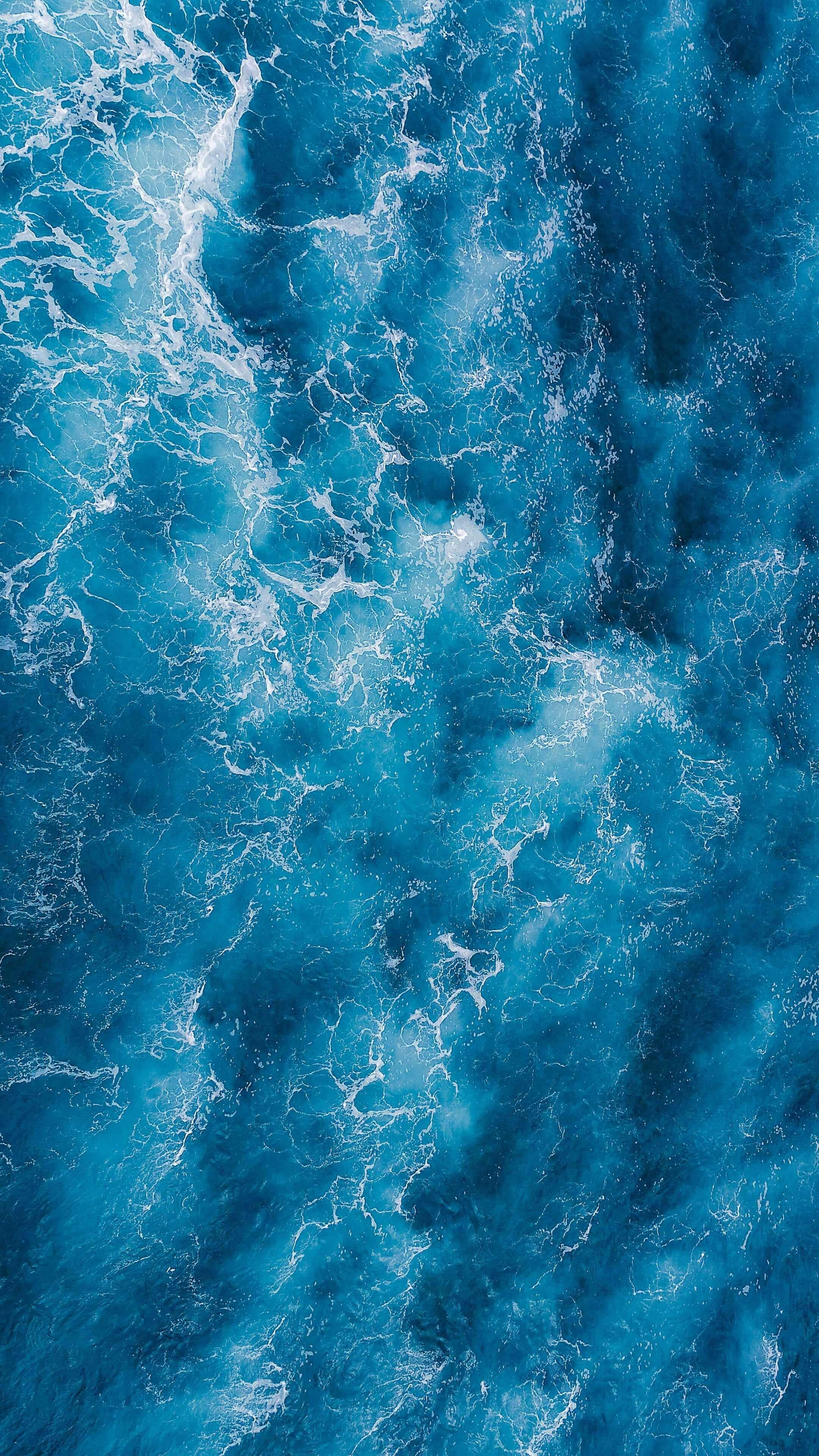 The beautiful blue waves of Android. — 2160x3840 wallpaper