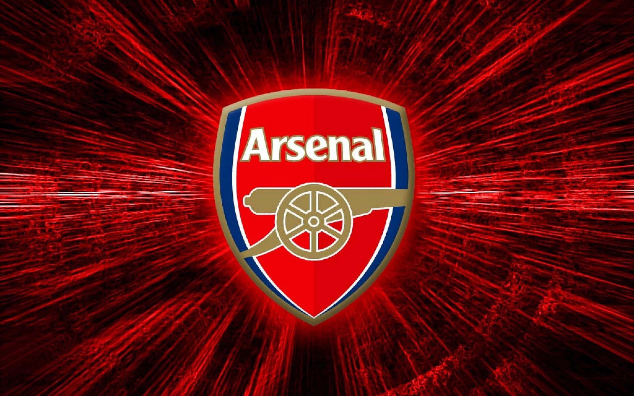 The Emirates Stadium packed with Arsenal fans during a thrilling match — 2560x1600 wallpaper