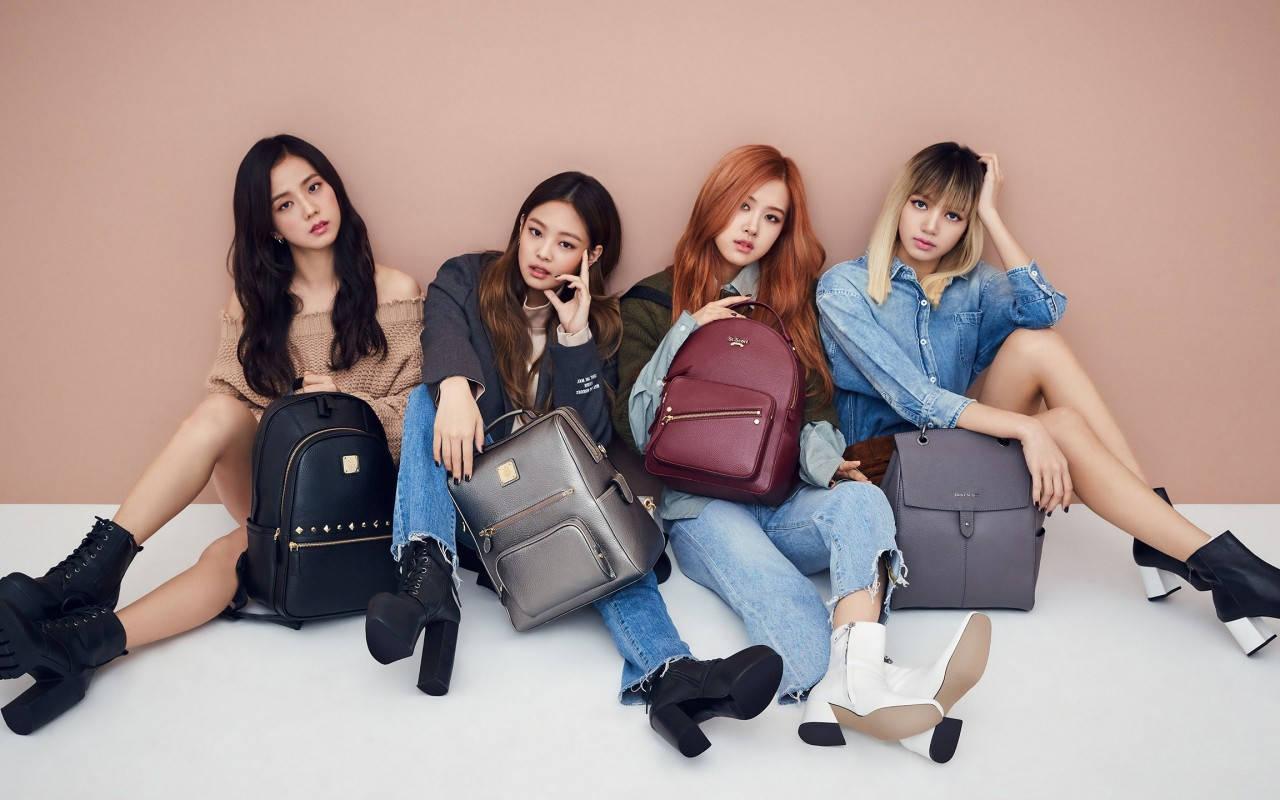 The four Blackpink members carrying their backpacks in style. — 1280x800 wallpaper