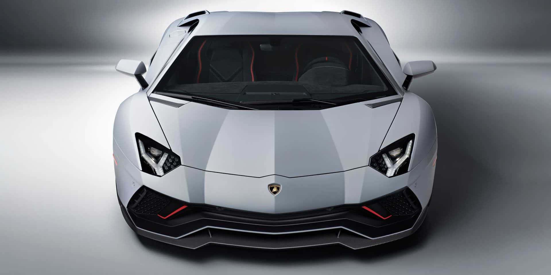 the front view of a white lamborghini sports car — 1920x960 wallpaper
