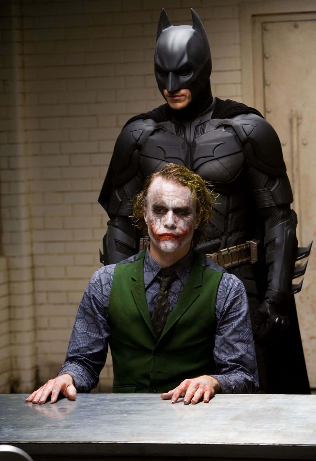 The Joker Cackles Uncontrollably — 1098x1600 wallpaper