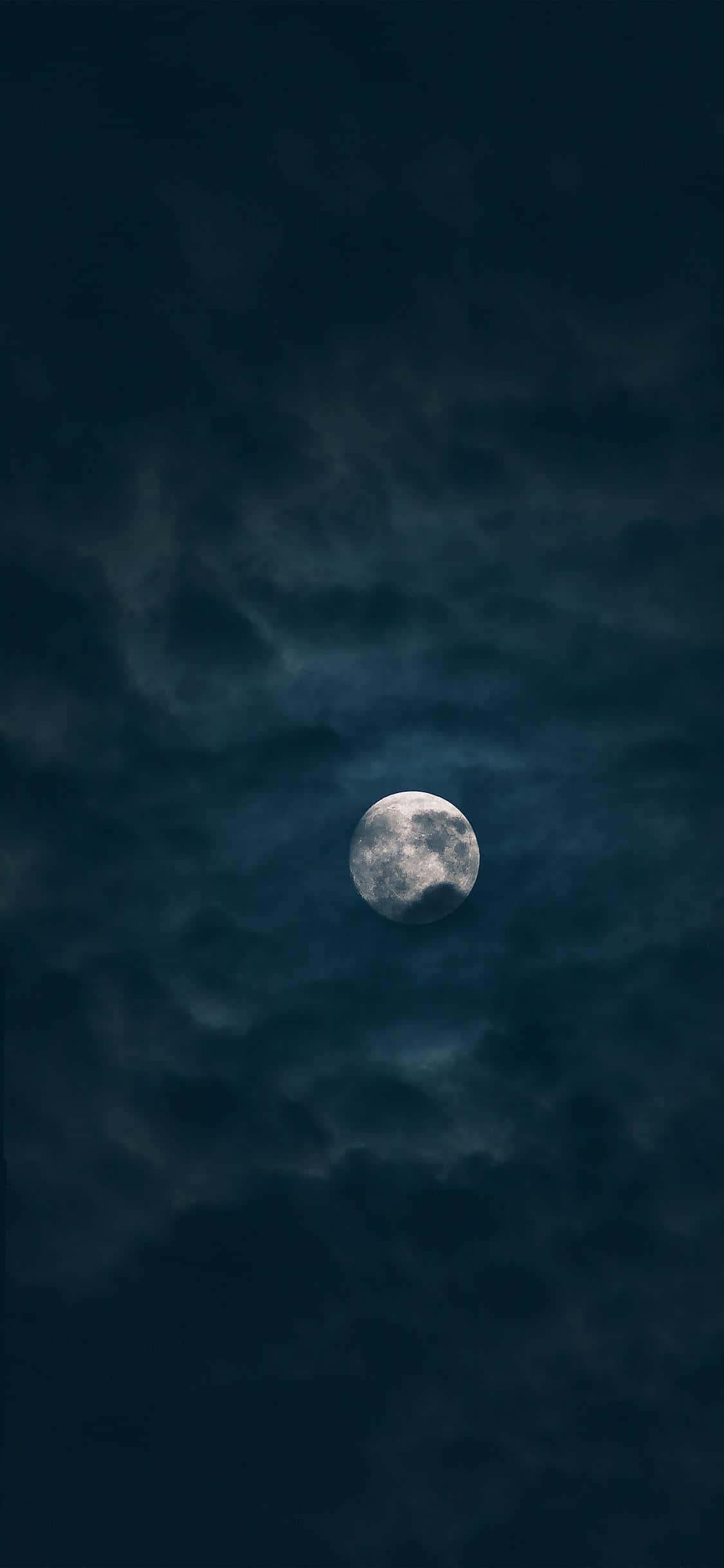 The Moon Dark Clouds iPhone — 1125x2436 wallpaper
