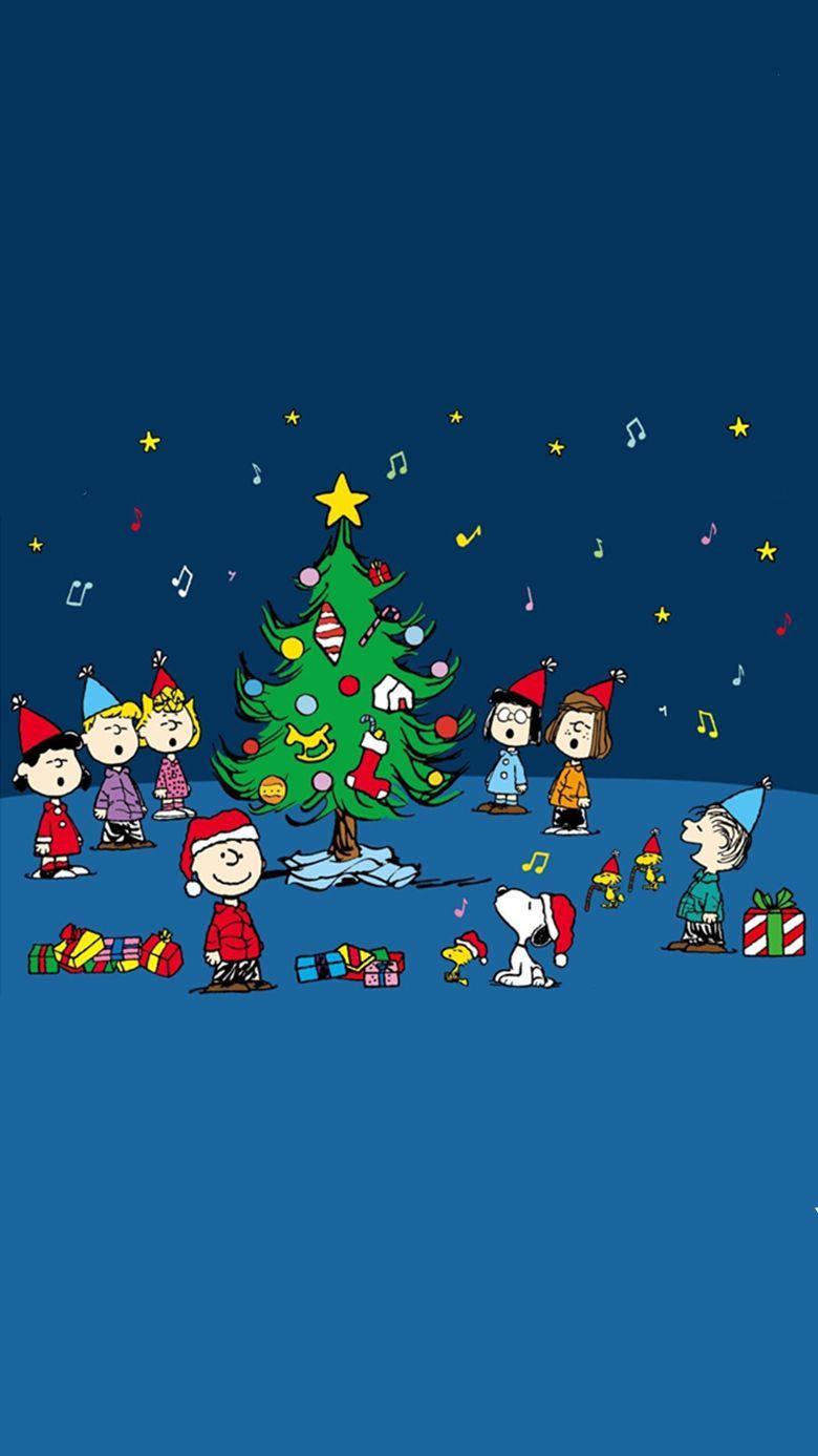 The Peanuts gang celebrating Christmas! — 780x1387 wallpaper