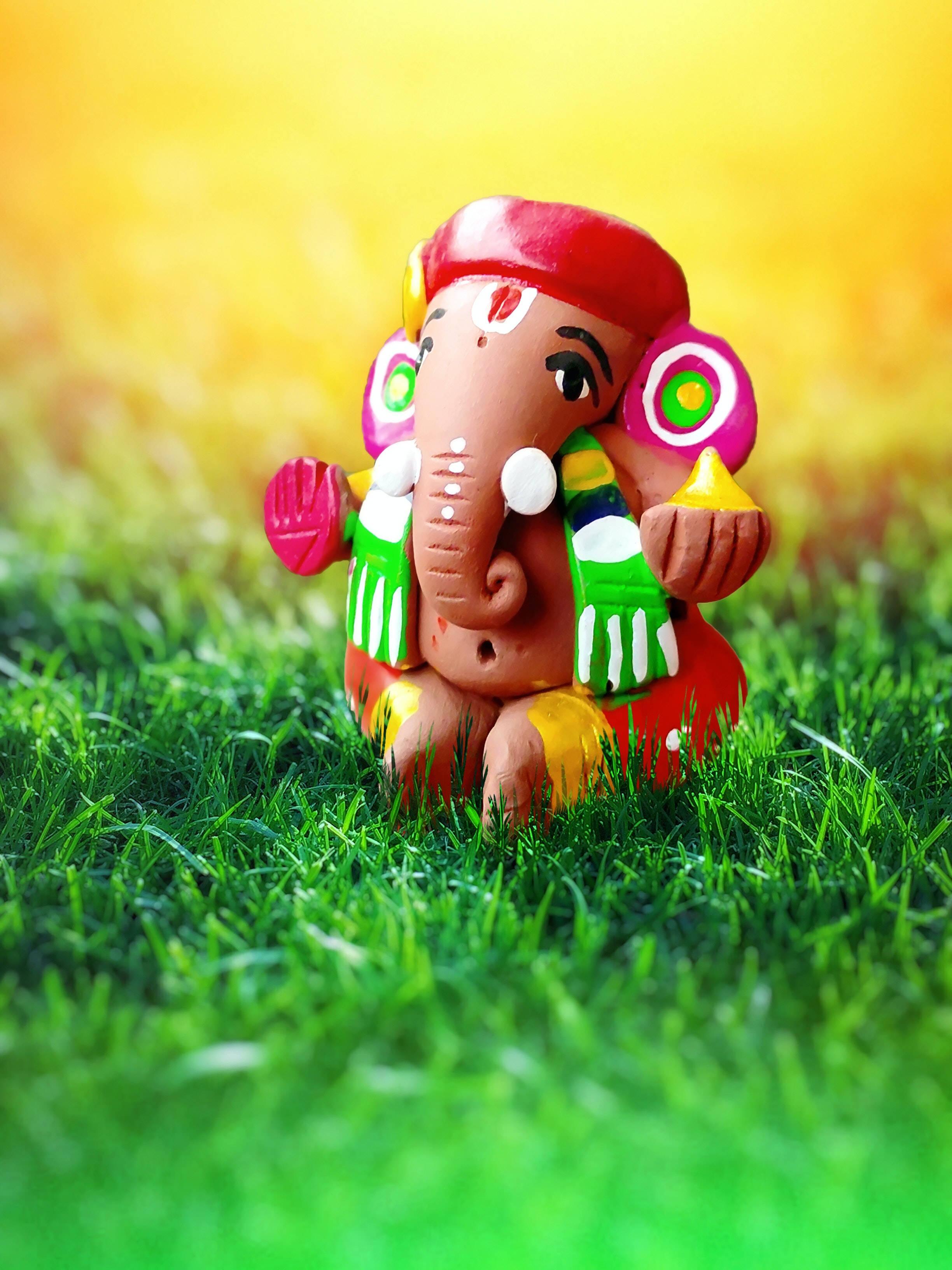Tiny Clay Ganesh Mobile — 2448x3264 wallpaper