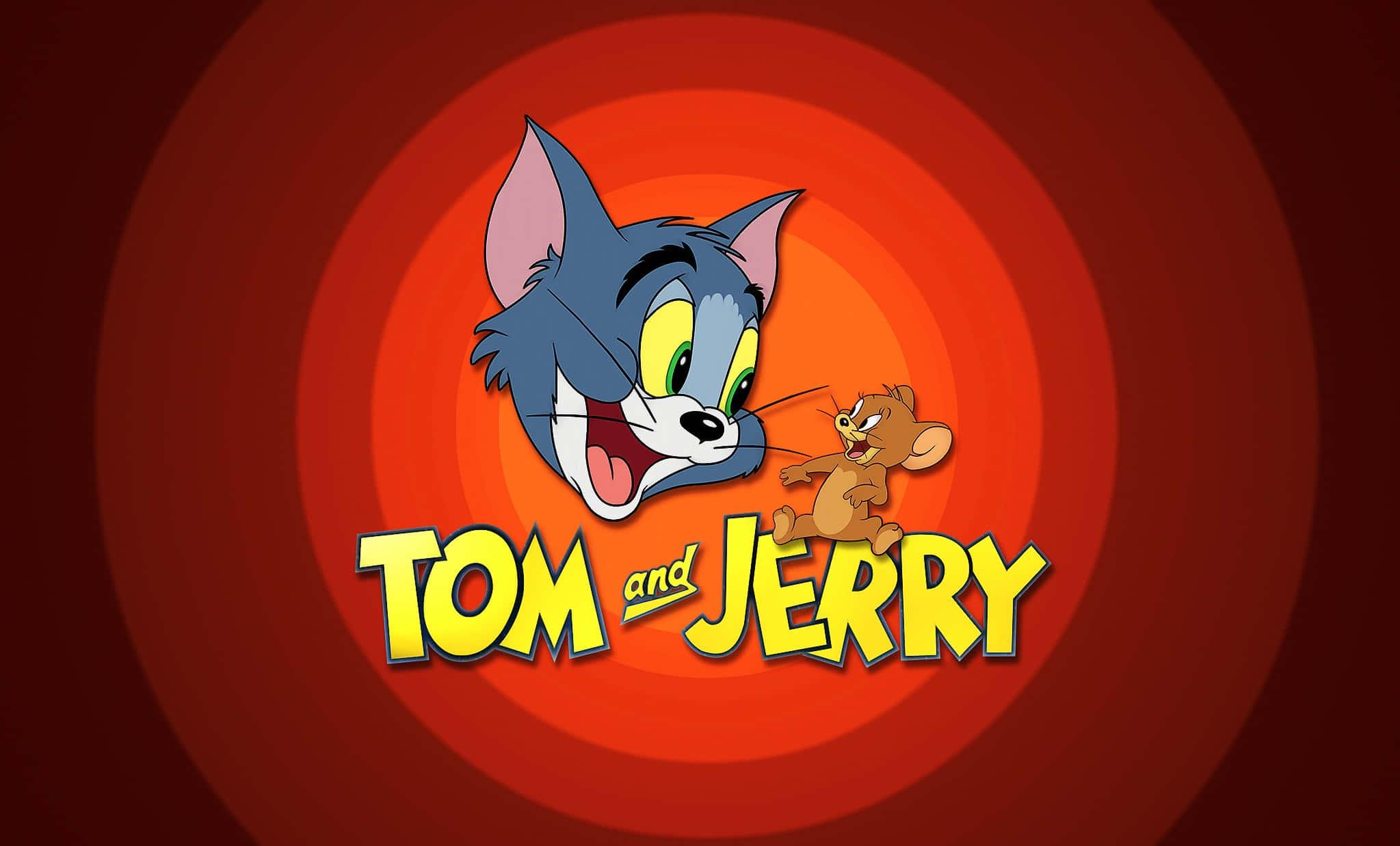 Tom and Jerry trying to outrun each other — 2047x1237 wallpaper