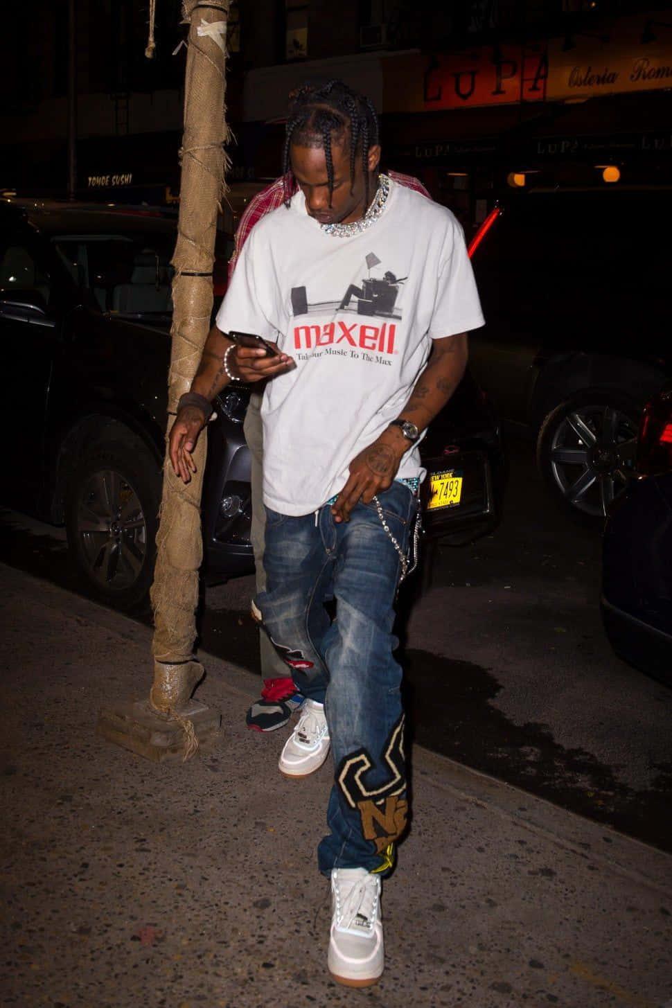 Travis Scott Attends Longchamp Celebration Of ‘Cactus Jack’ Capsule Collection — 970x1455 wallpaper