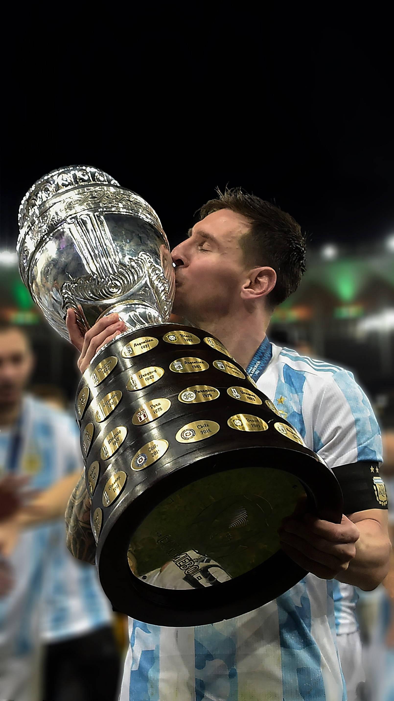 Trophy Kiss Messi 4k Ultra HD — 1610x2862 wallpaper