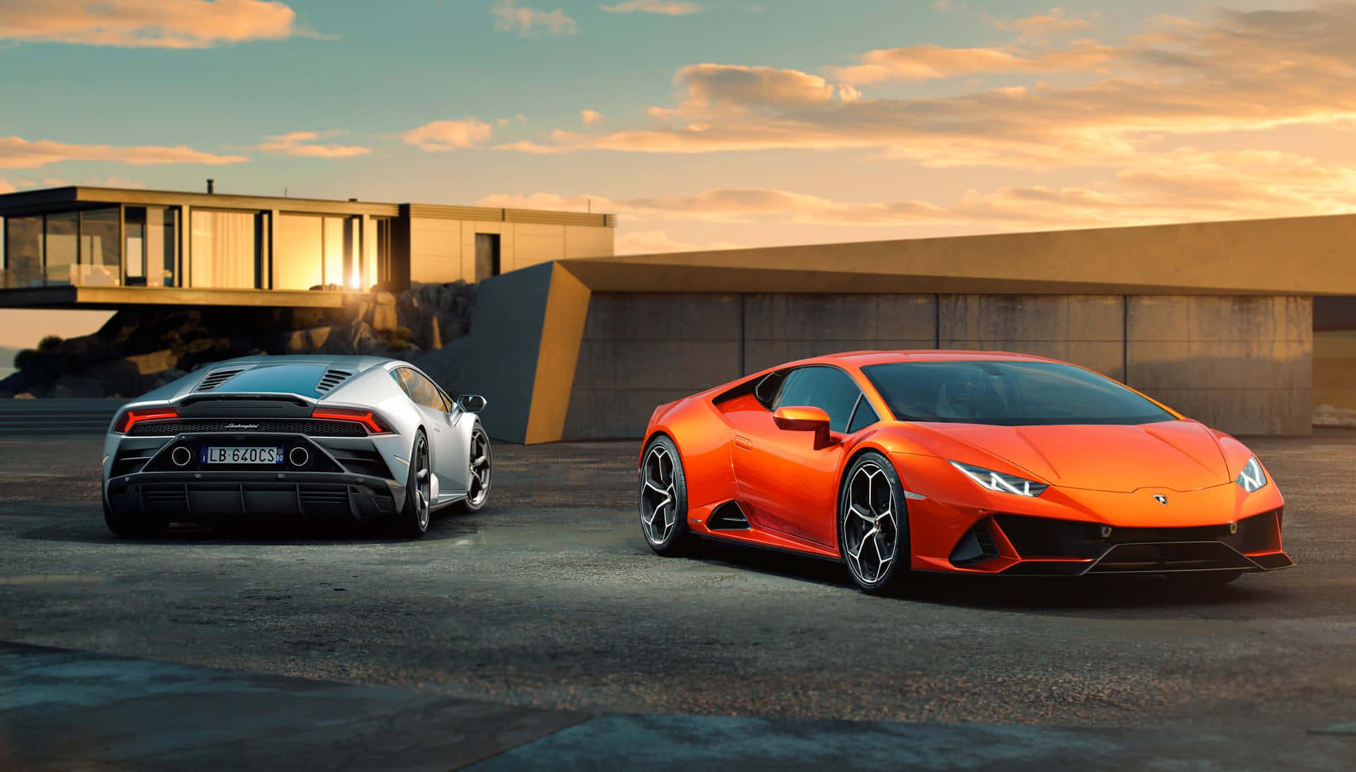 two sports cars parked in front of a building — 1920x1093 wallpaper