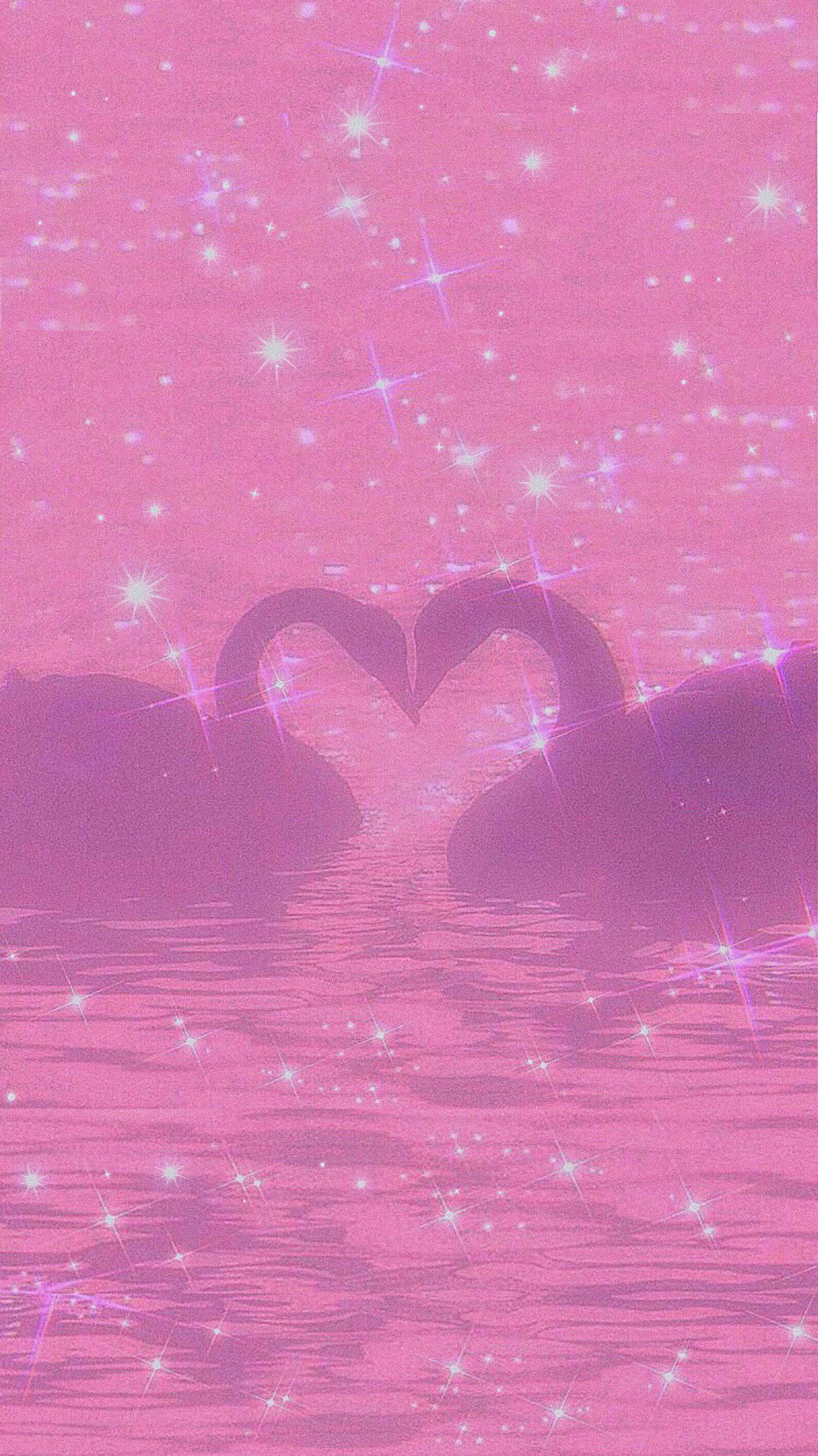 two swans making a heart shape in the water — 1590x2828 wallpaper