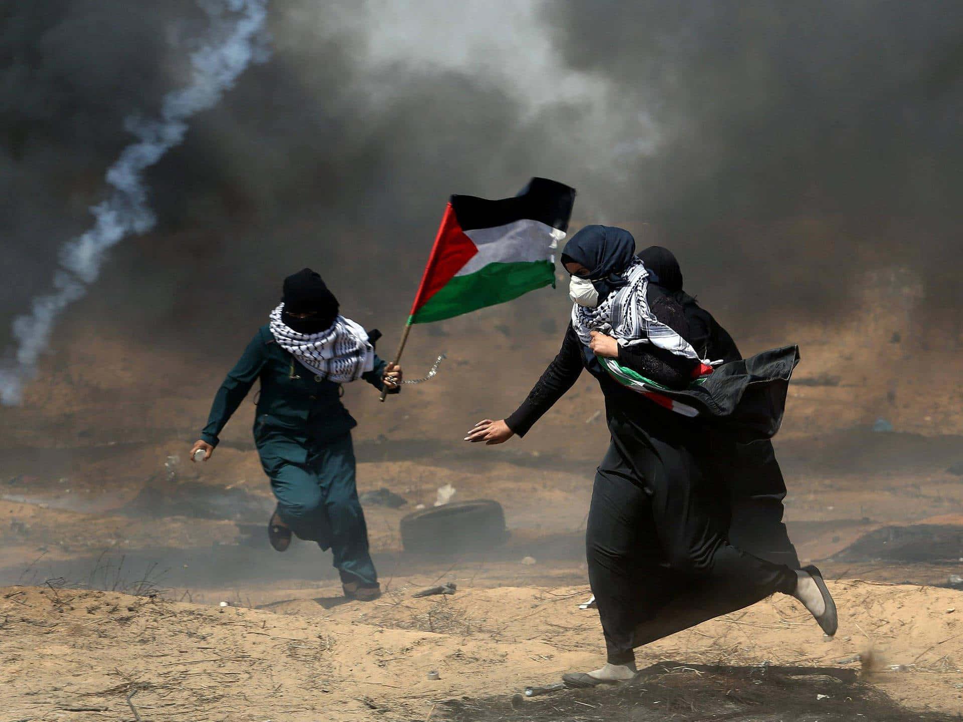 two women running with a palestinian flag — 1920x1440 wallpaper