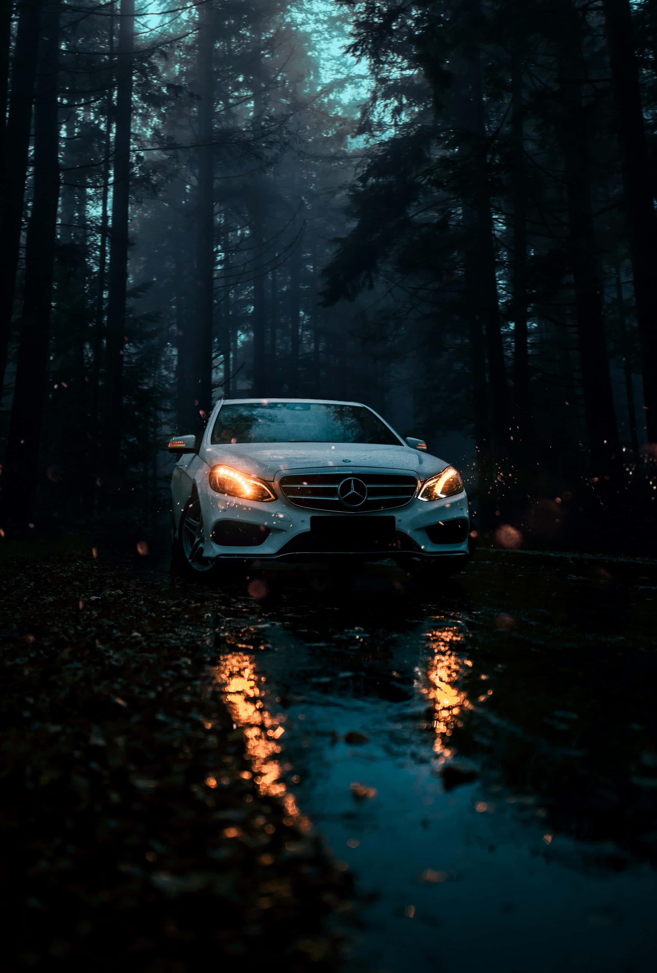 White Car On Damp Road Phone Background — 2200x3258 wallpaper
