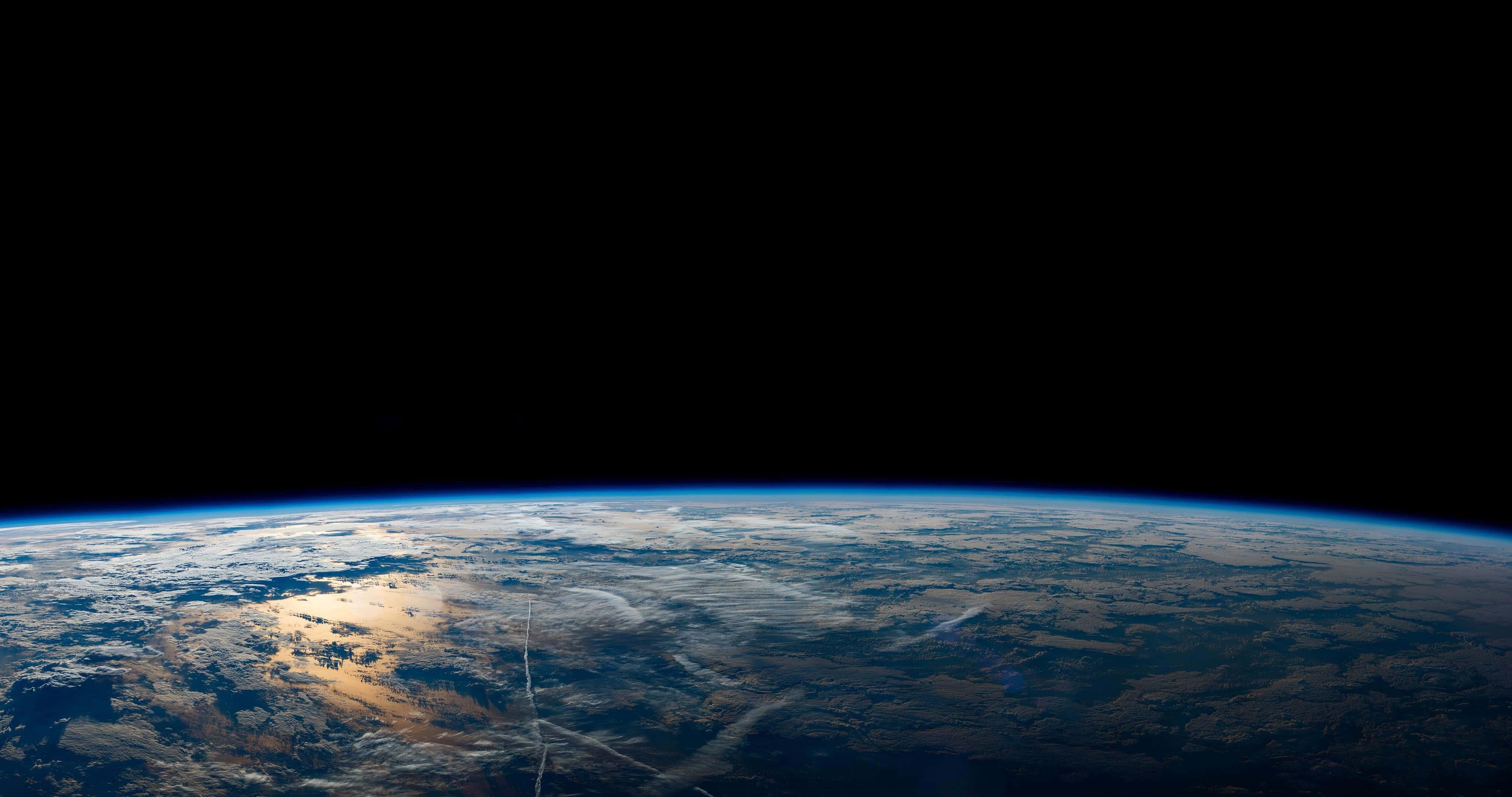 White Thick Clouds Over Earth Background — 4096x2160 wallpaper