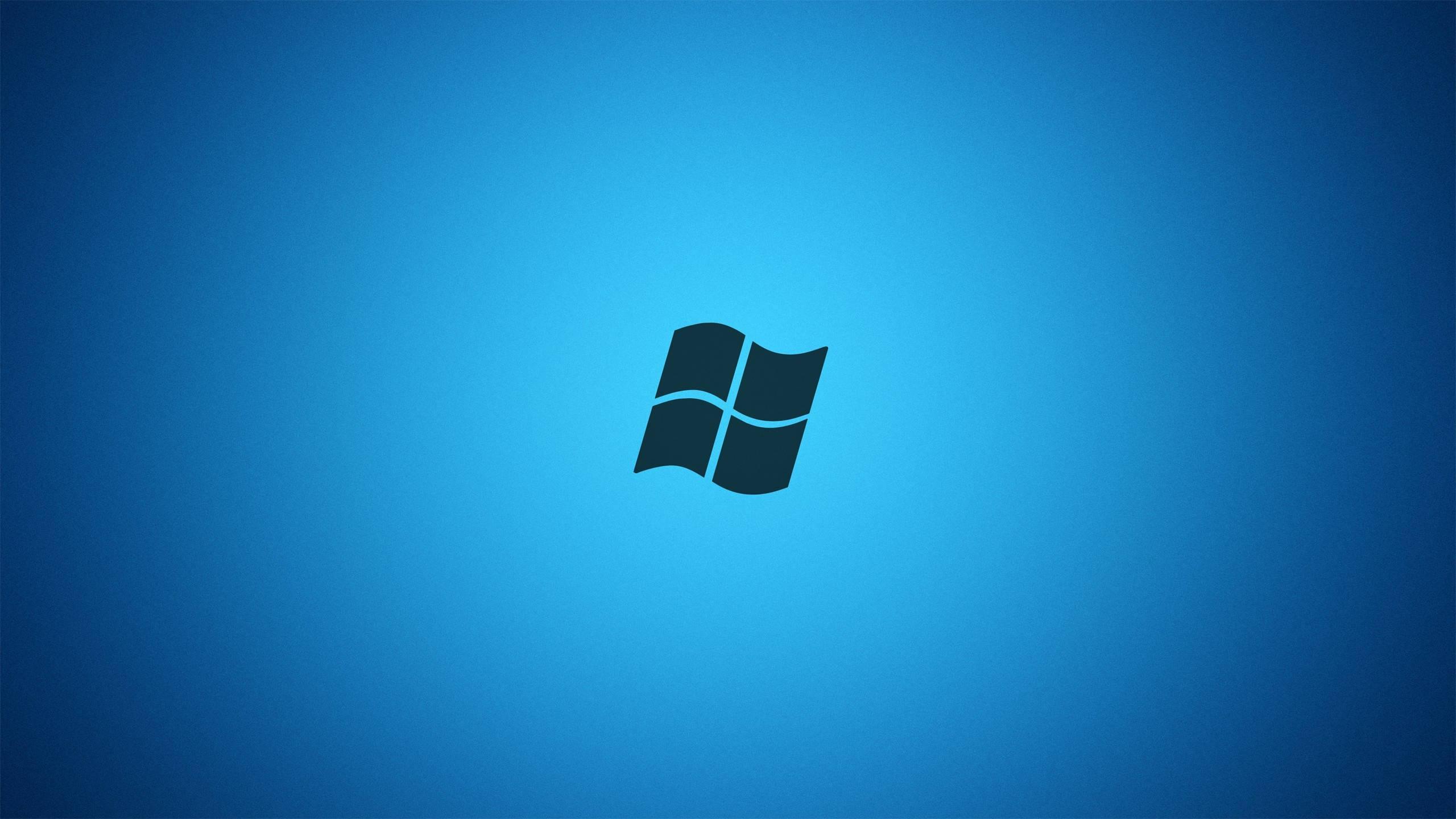 Windows 7 on Midnight Blue and Black — 2560x1440 wallpaper