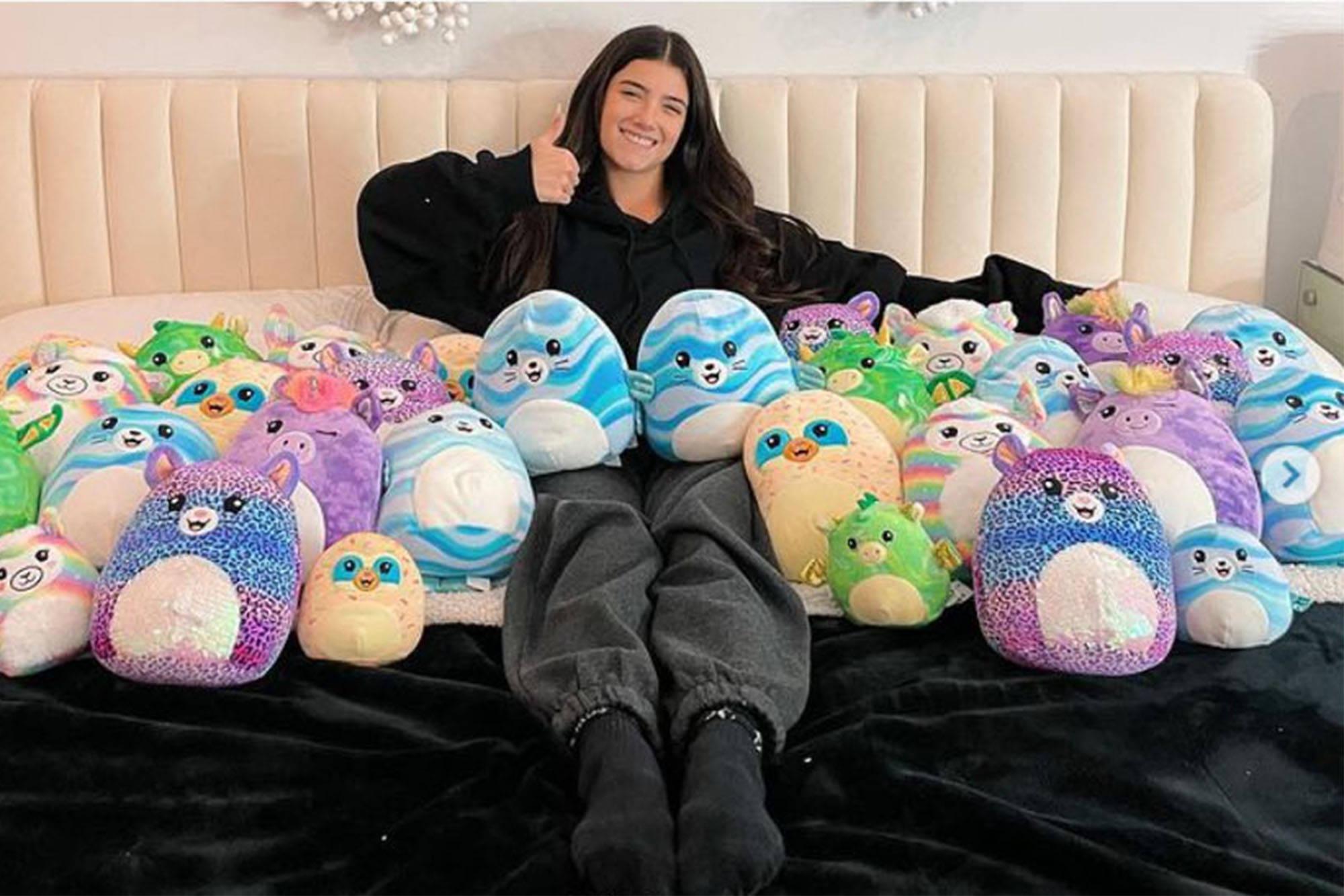 Woman With Squismallows Toys Collection — 2000x1333 wallpaper