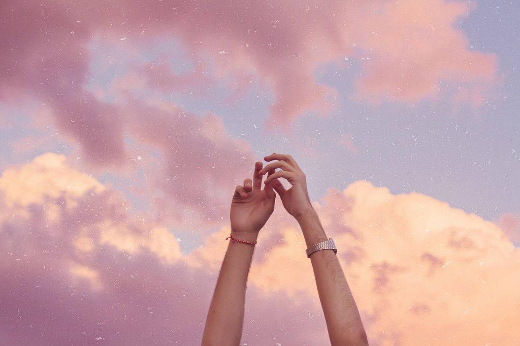 Woman's Hands Under Pink Sky PFP Aesthetic — 1024x683 wallpaper