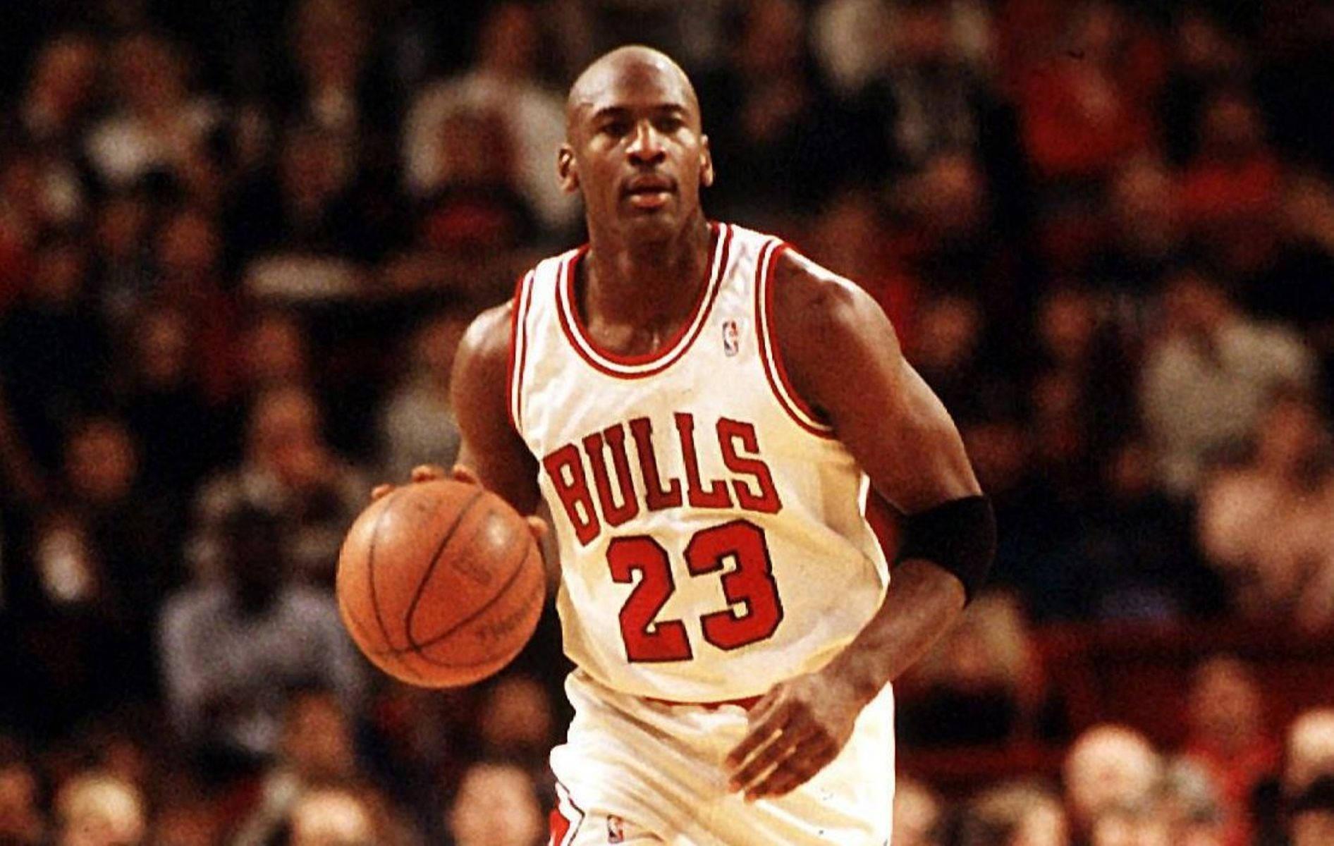 Young Michael Jordan gracing the court — 1892x1200 wallpaper